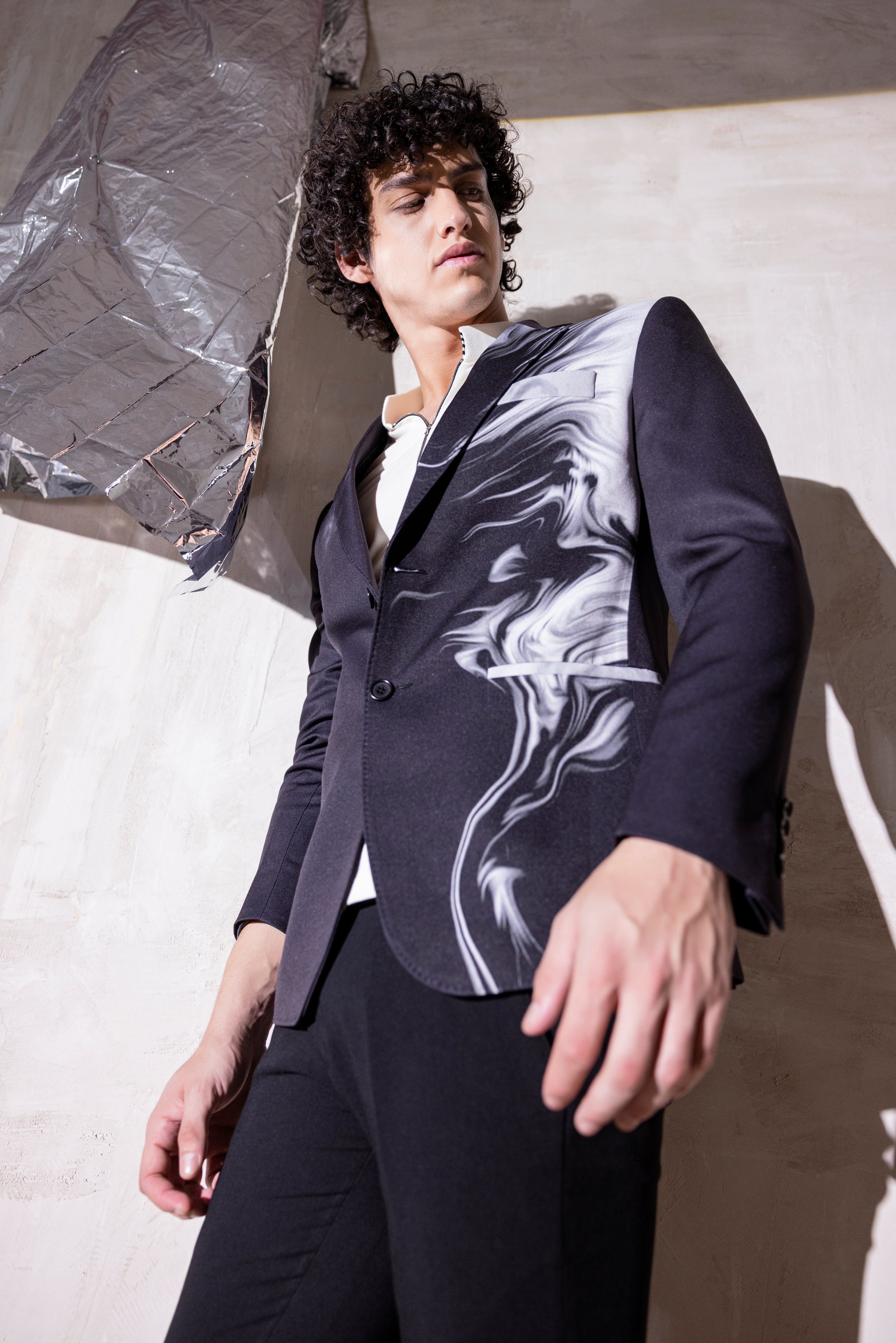 Digital print blazer with abstract design.