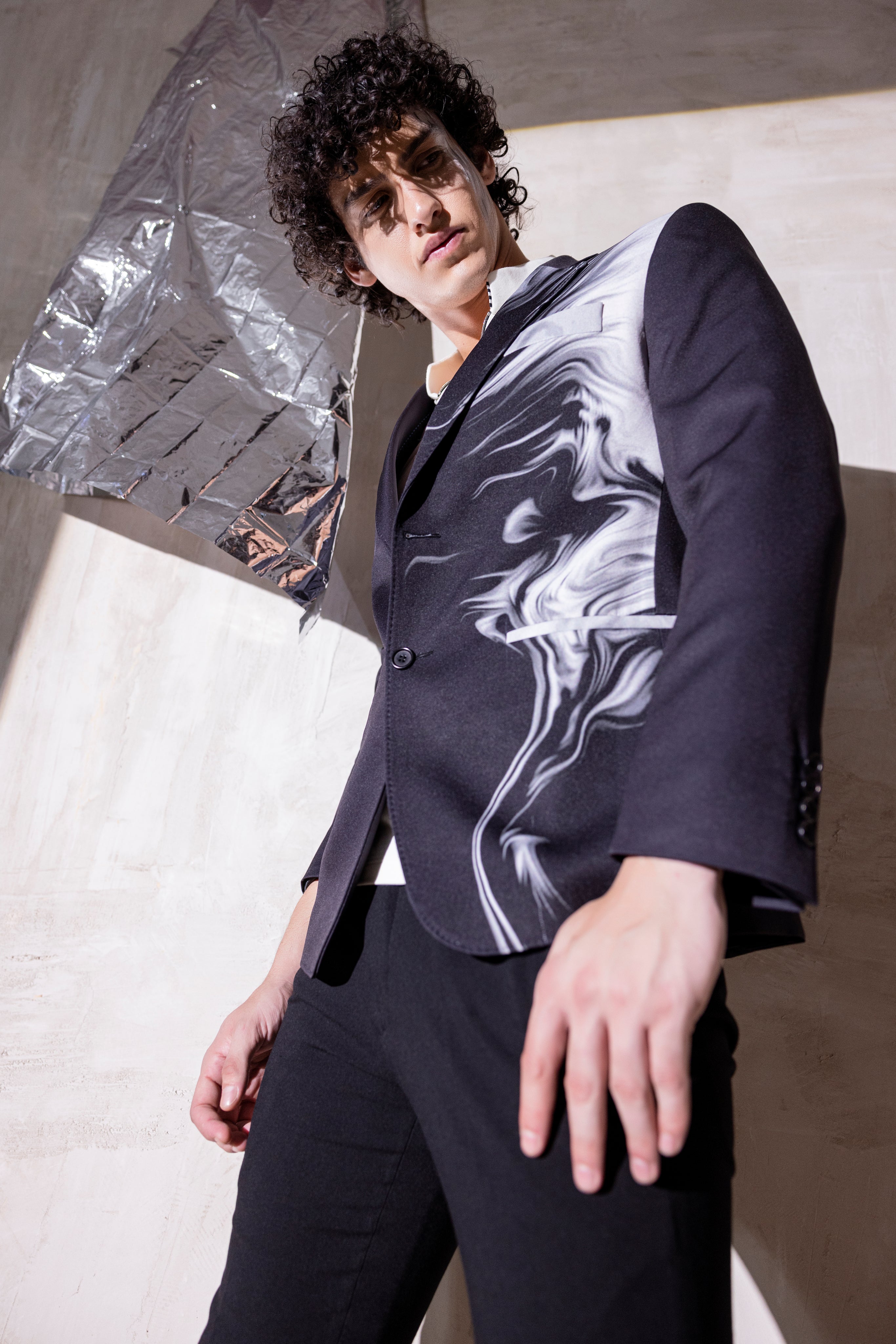 Digital print blazer with abstract design.