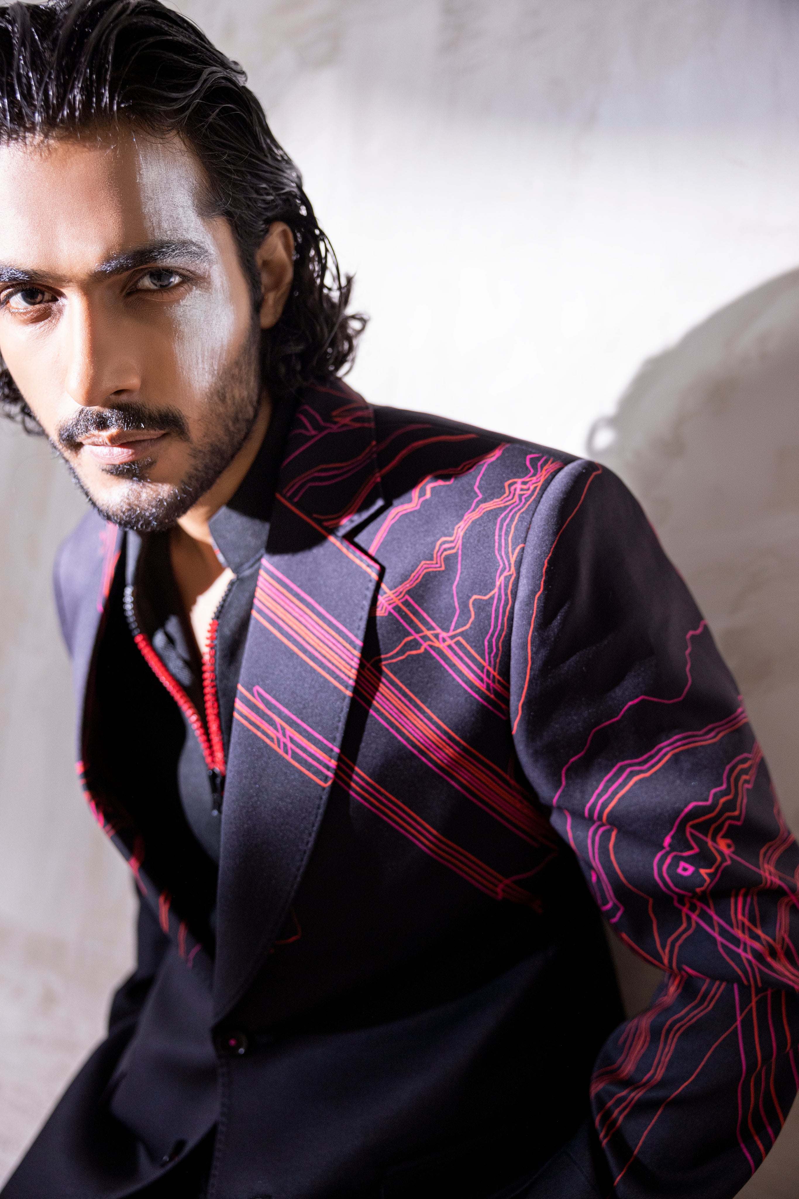 Digital print blazer with abstract design.