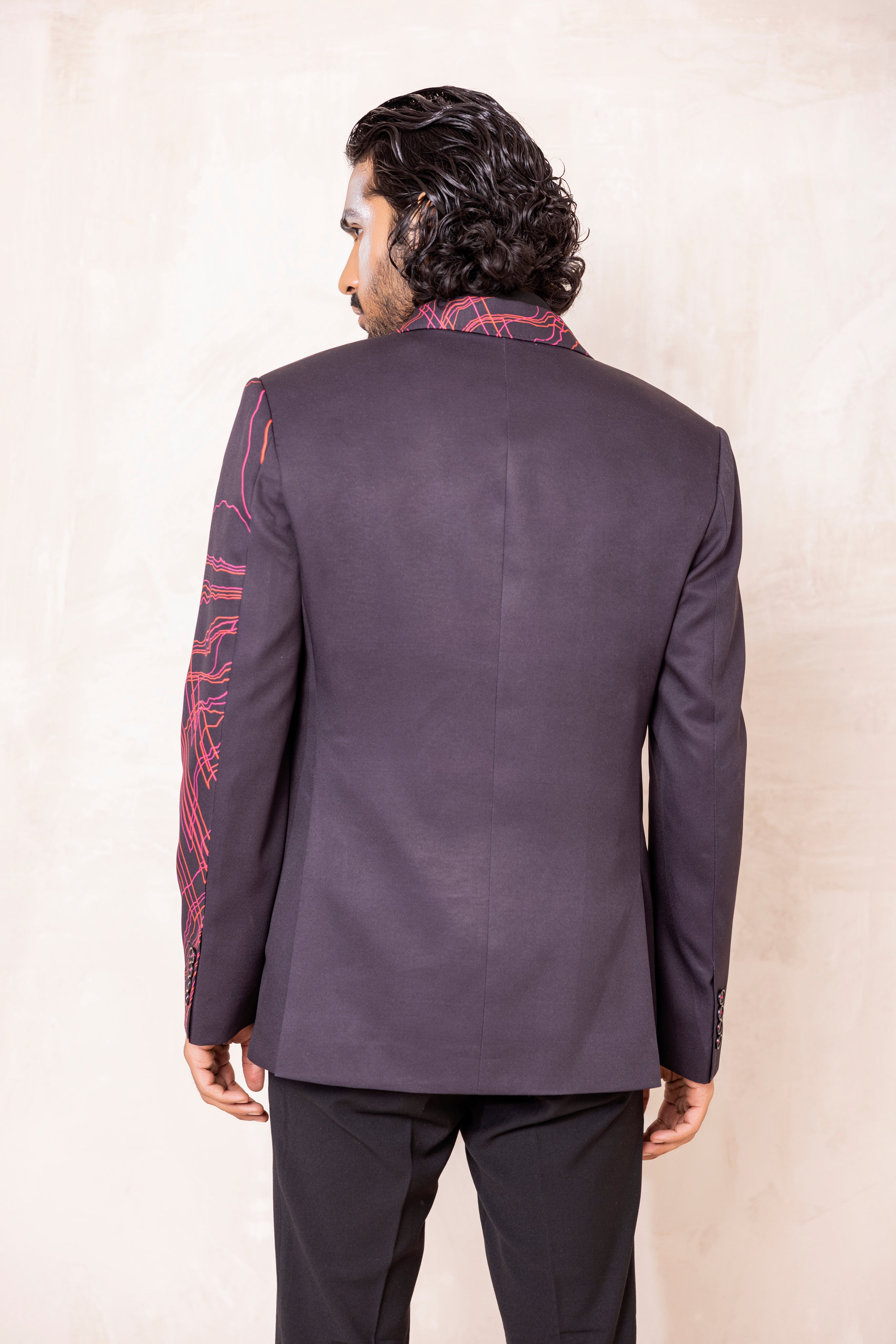 Digital print blazer with abstract design.