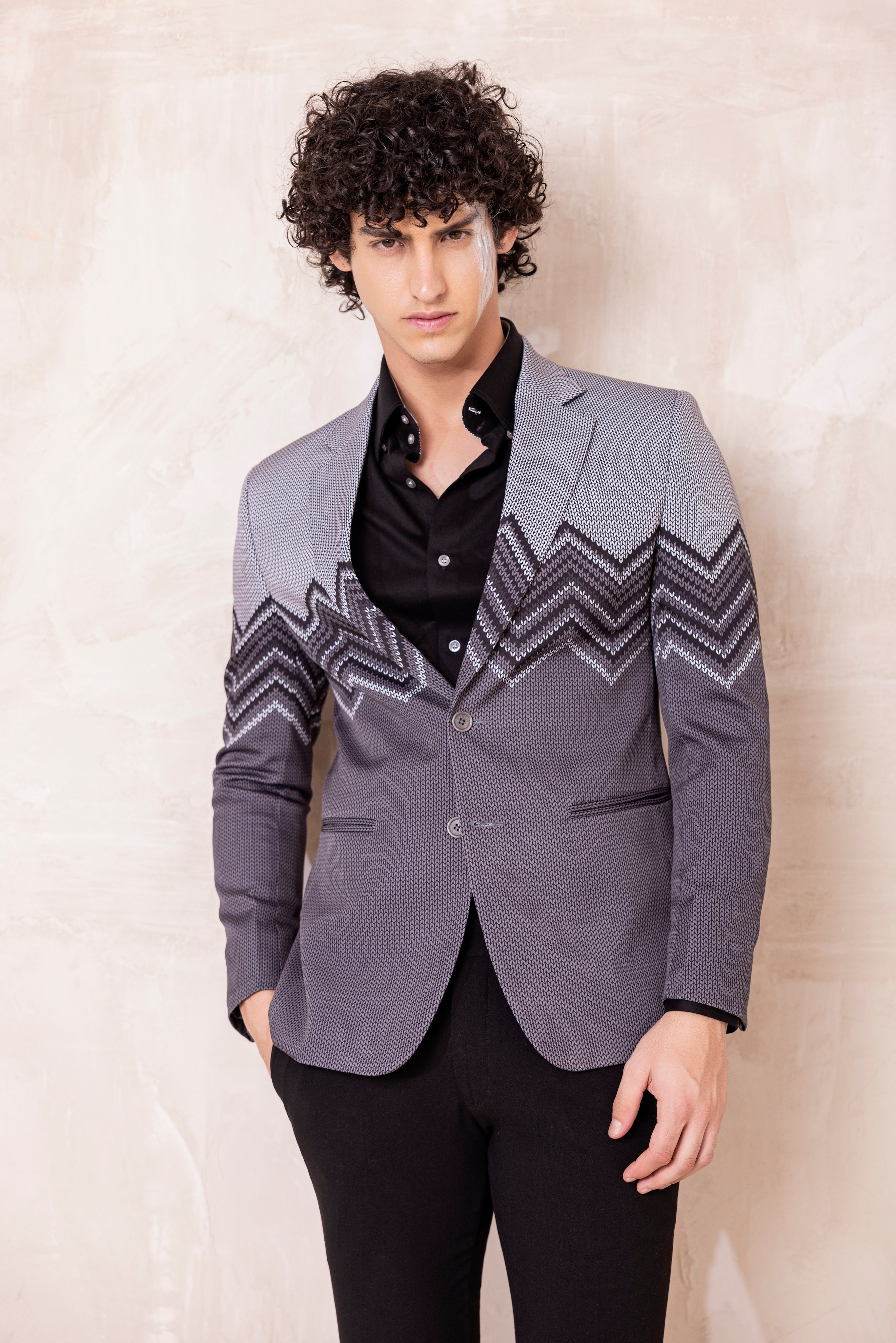 Digital print blazer with abstract design.