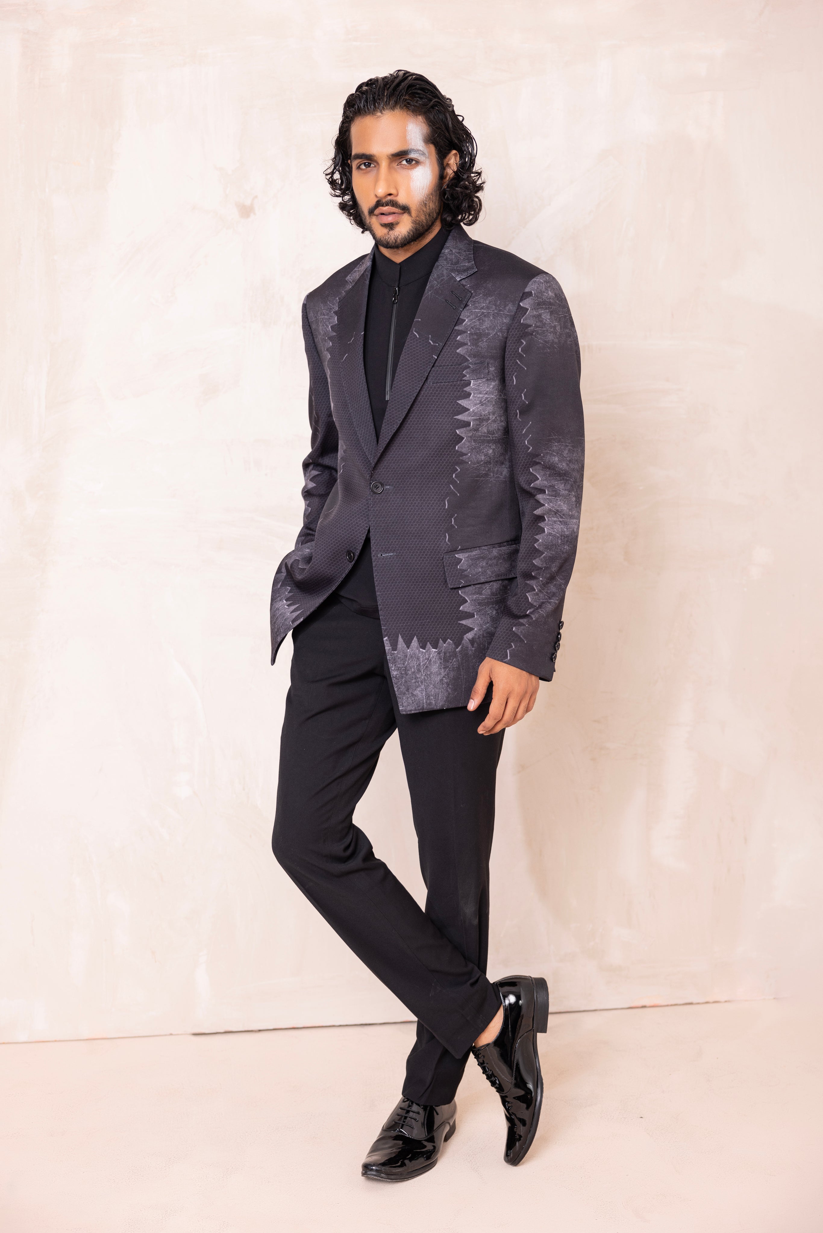 Digital print blazer with abstract design.