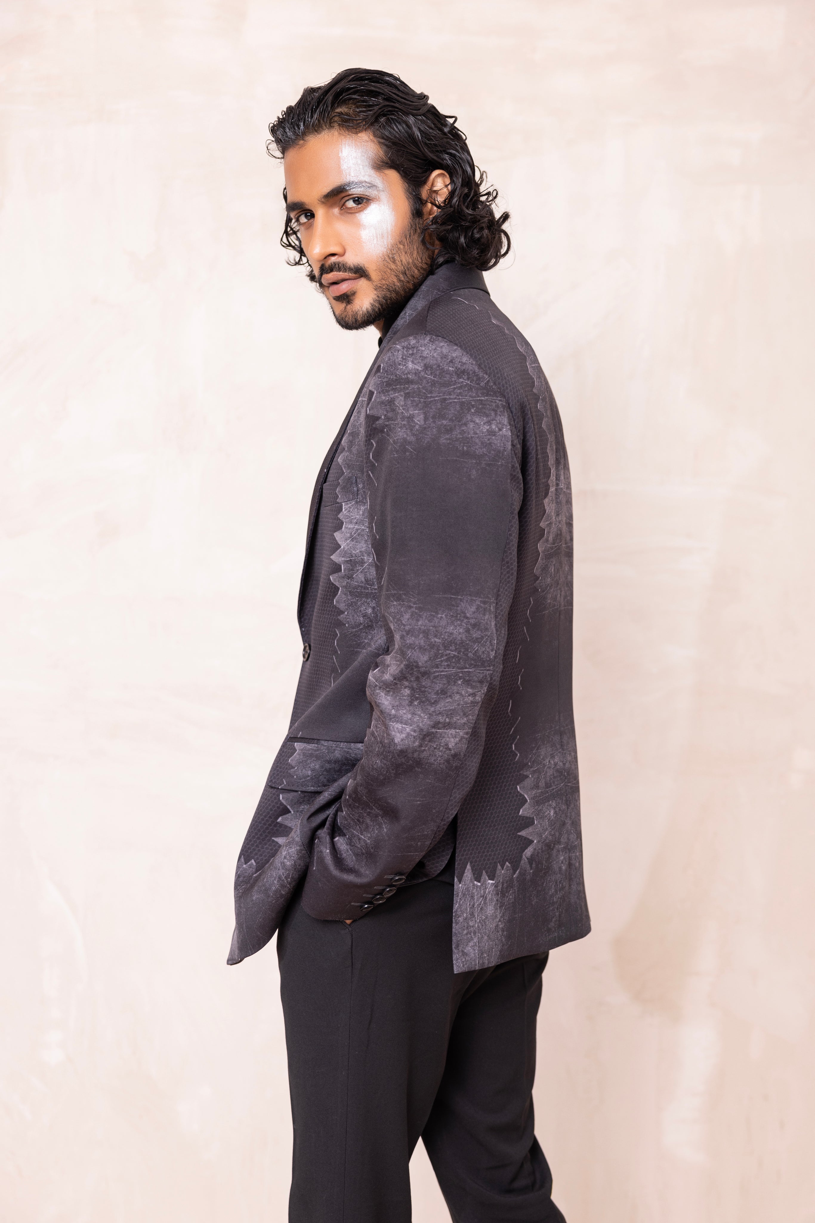 Digital print blazer with abstract design.