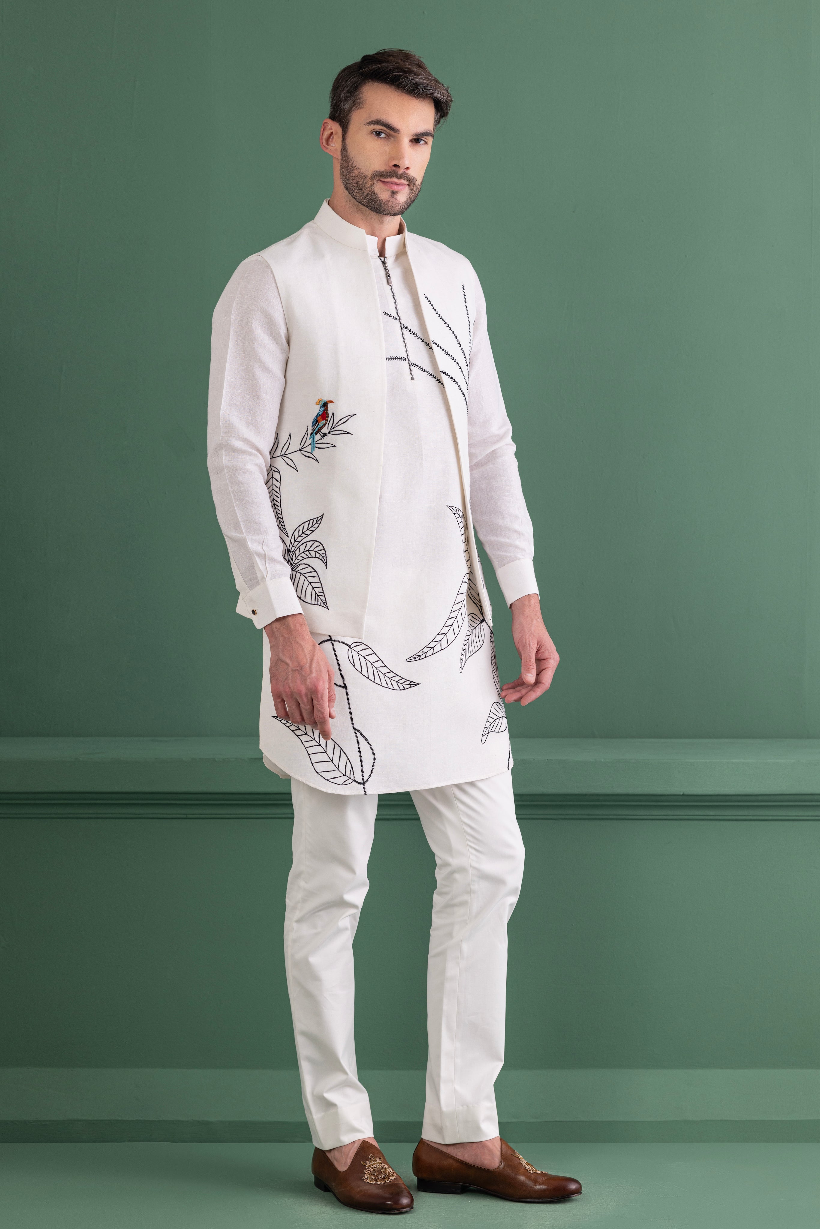 Ivory embroidered waistcoat and kurta set paired with matching aligadhi