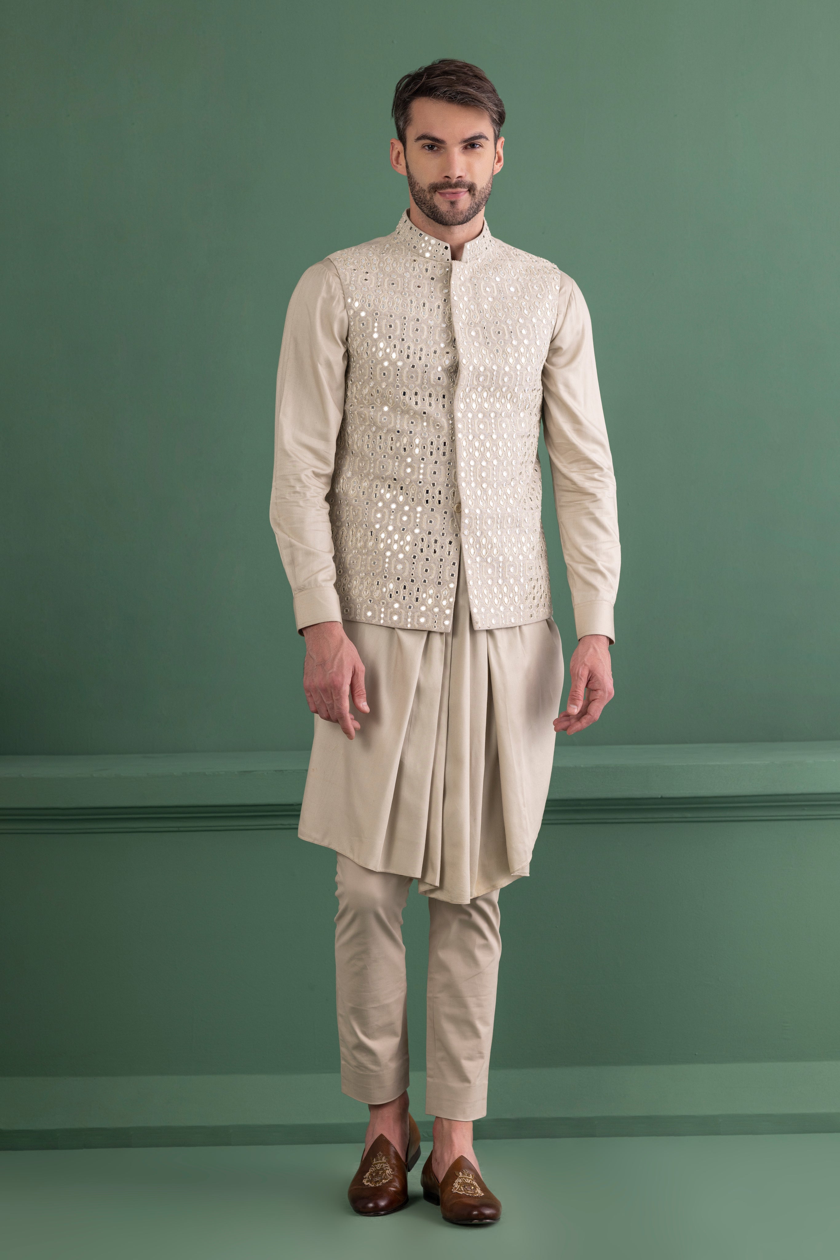 Light olive mirror work waistcoat paired with a cowl kurta and beige aligadhi