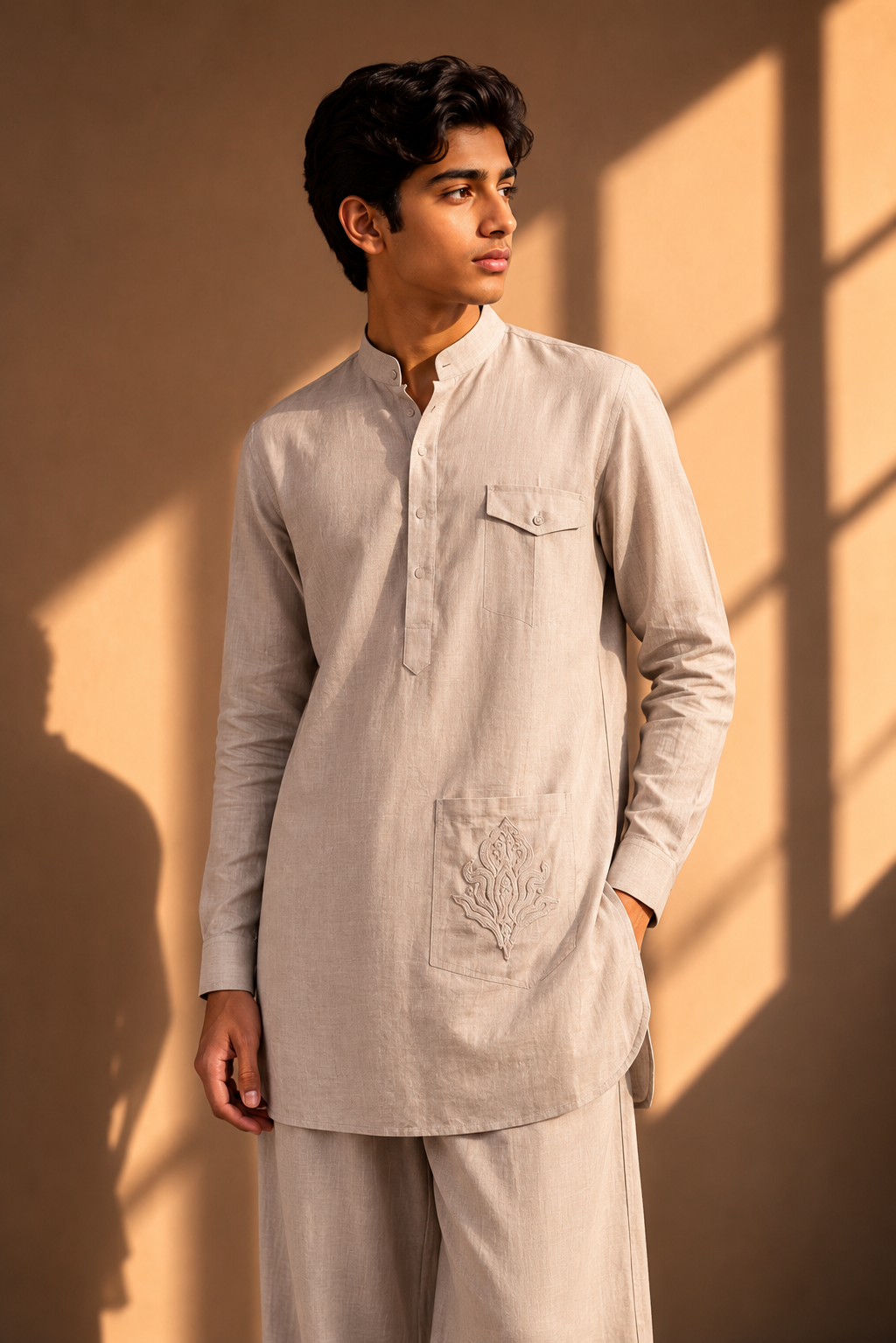 Beige short linen kurta with embroidered patch pocket detailing, paired with a matching plazzo