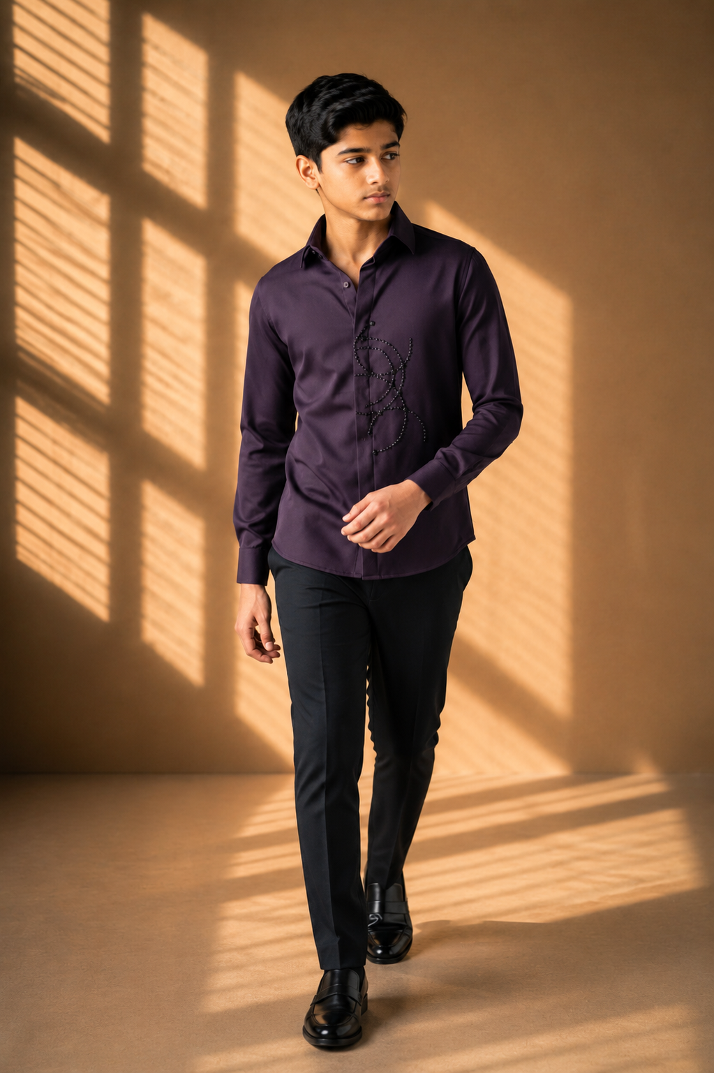 Purple shirt with abstract hand-embroidered metal motif