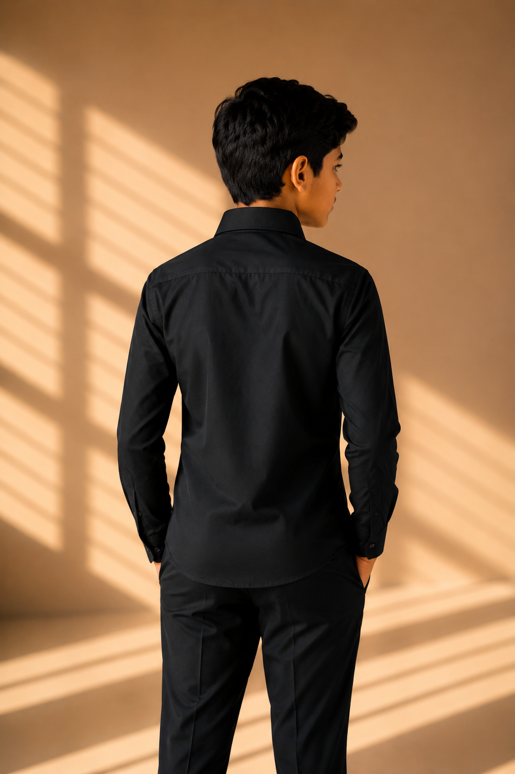 Black shirt with hand-embroidered spider web motif