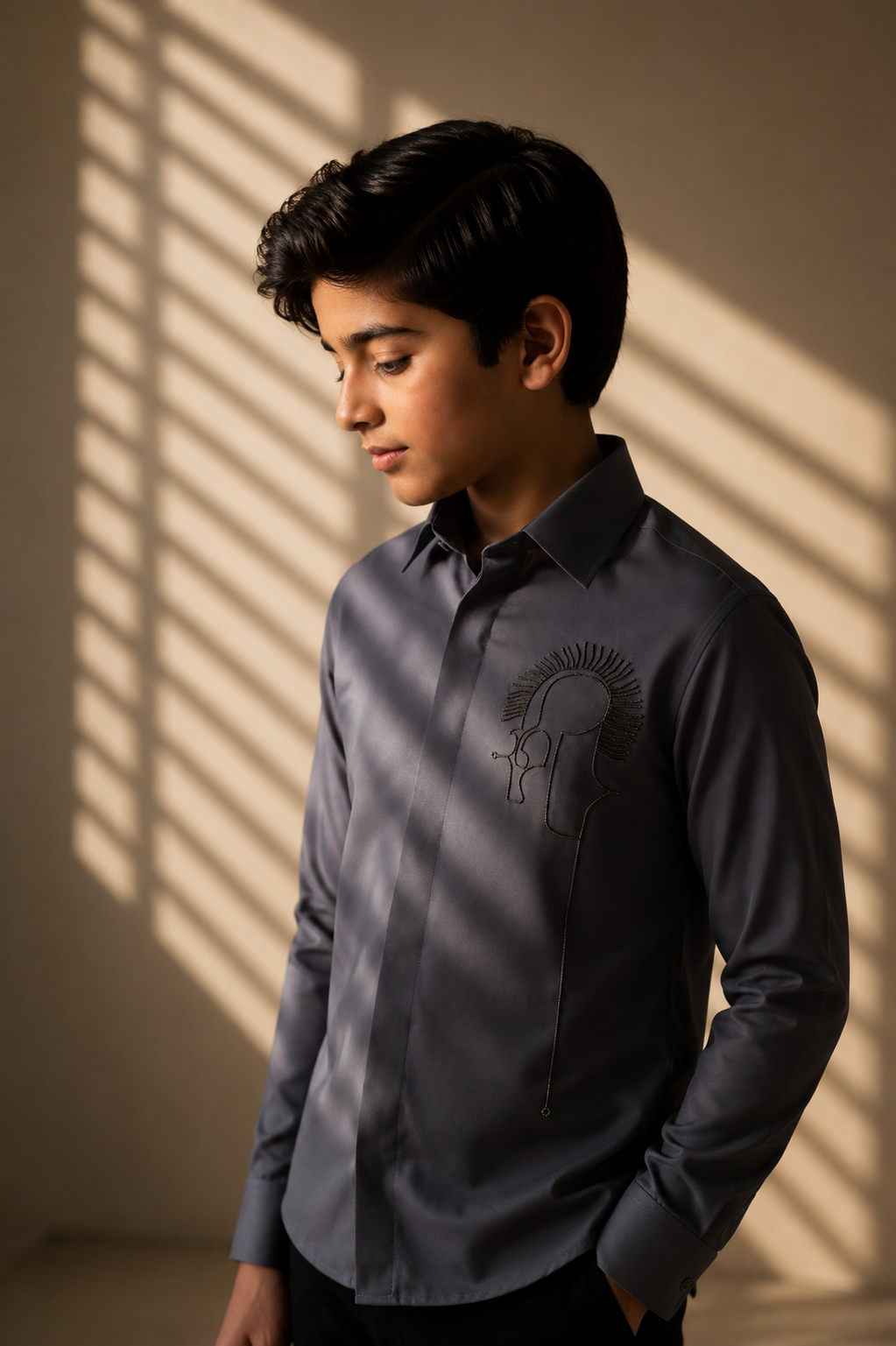 Grey shirt with abstract hand-embroidered metal motif