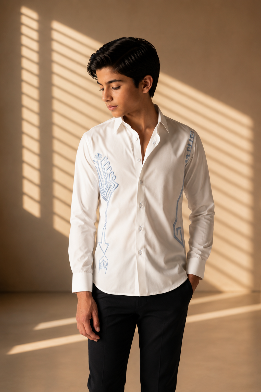 White shirt with embroidered sky blue geometrical motifs