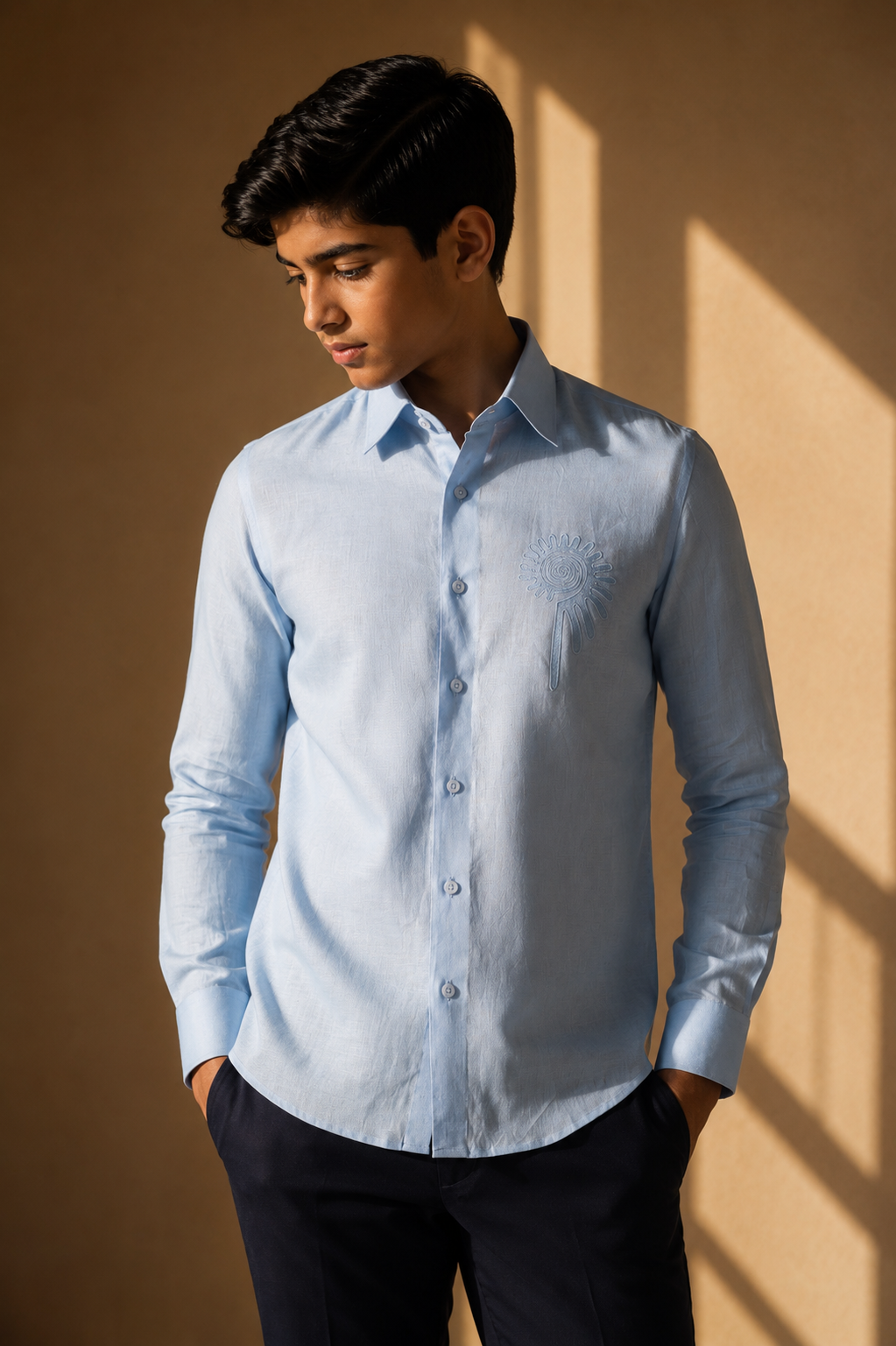 Sky blue linen shirt with embroidered floral motif