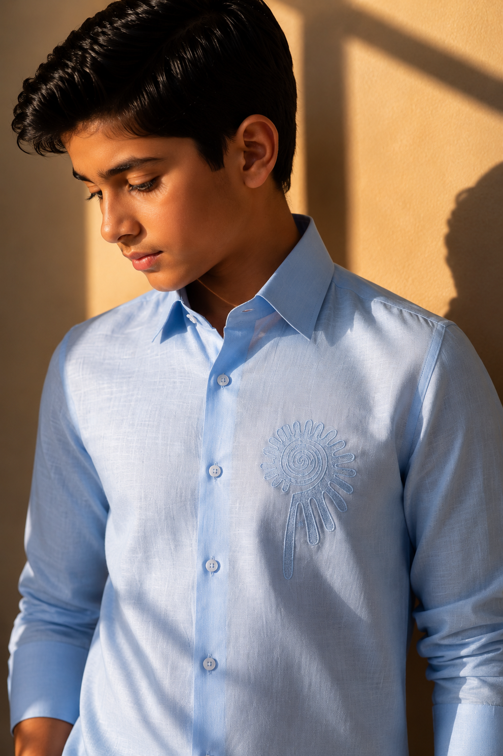 Sky blue linen shirt with embroidered floral motif