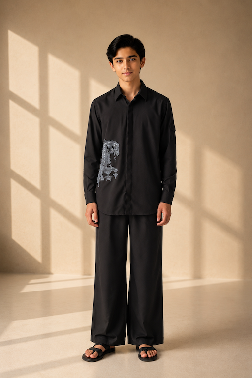 Black crepe shirt with hidden button placket and thread embroidery detailing, paired with a matching plazzo