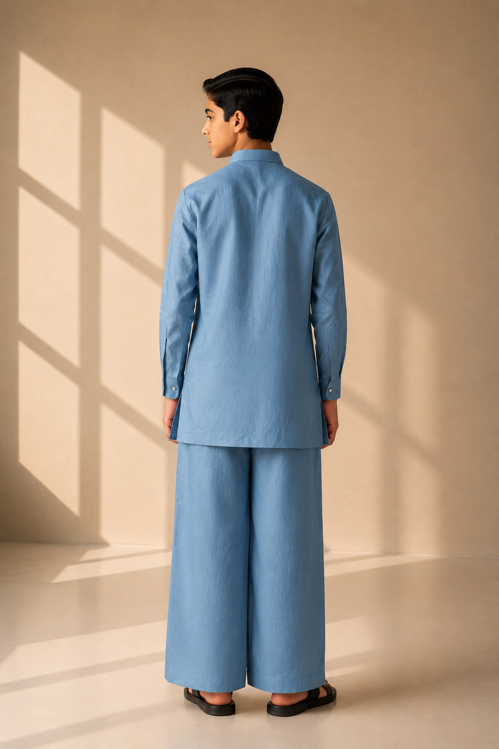Sky blue linen short kurta with patch pocket & thread embroidery detailing, paired with a matching plazzo