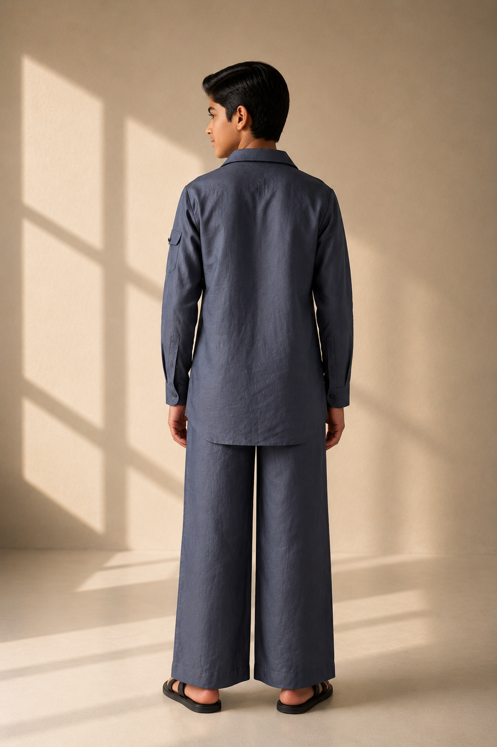 Grey short linen kurta with button detailing, paired with a matching plazzo