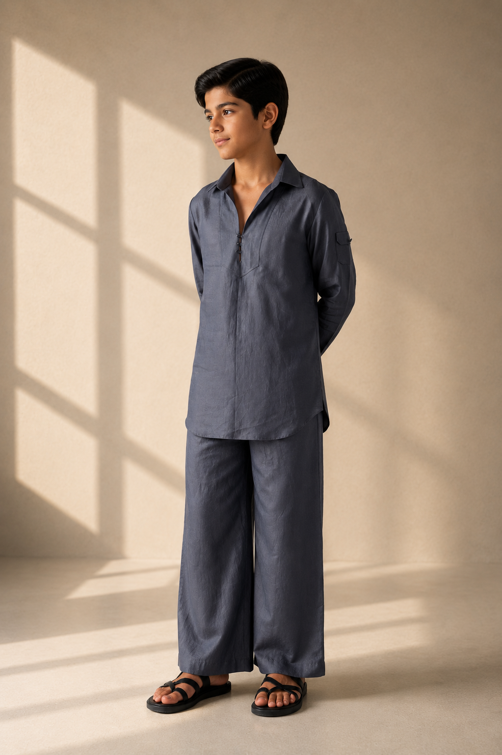 Grey short linen kurta with button detailing, paired with a matching plazzo