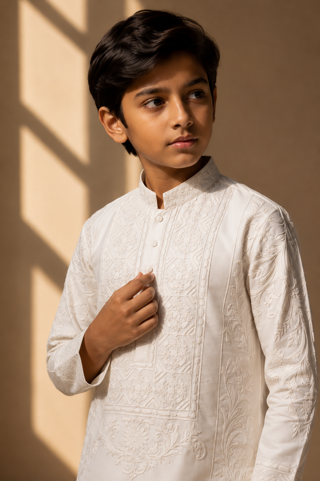 Featuring ivory slik linen kurta with front pannel embroidery with dori paired with aligarhi pants. Perfect attire for day pre wedding occaions