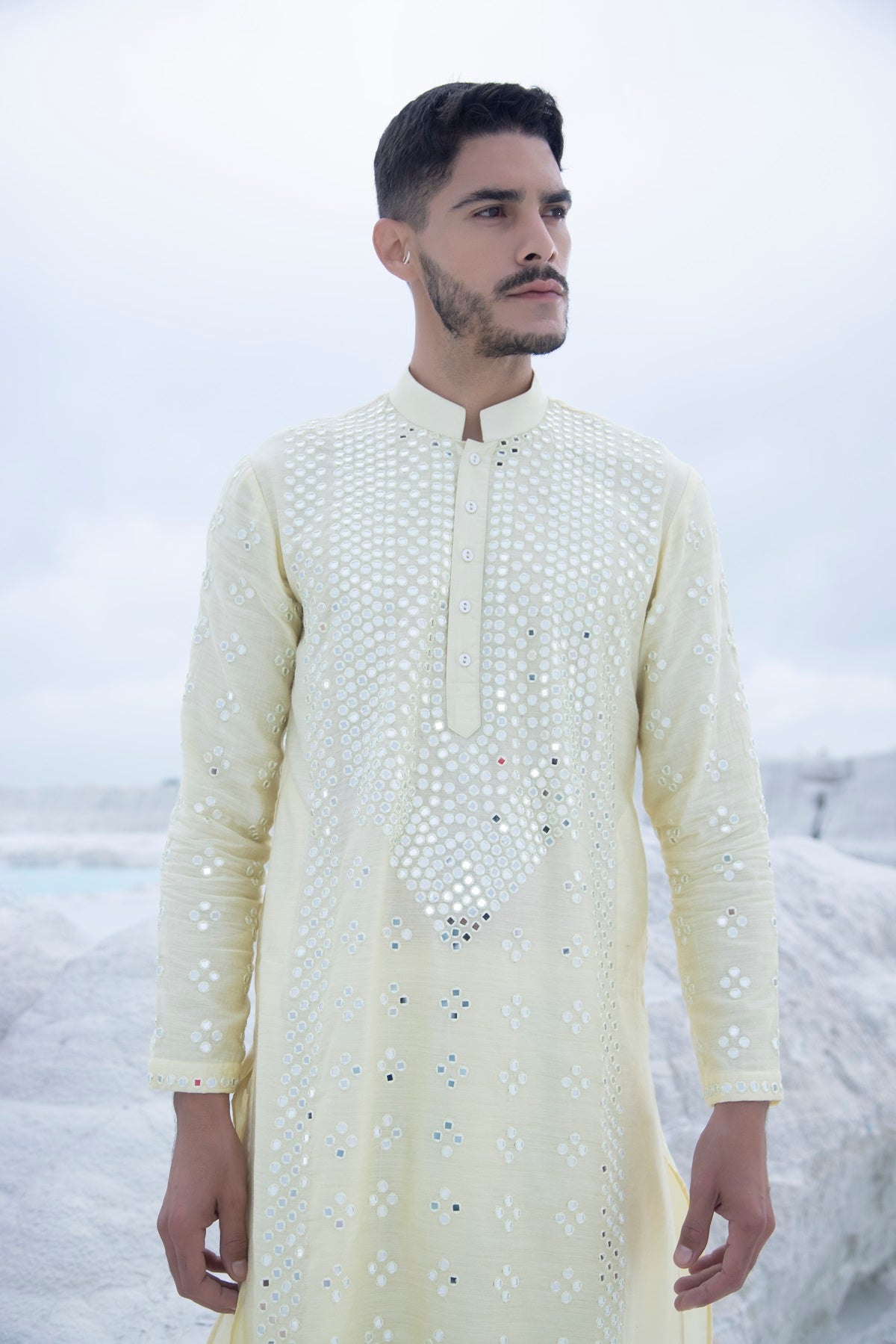 Pastel Silk Kurta with hand embroidered mirror work paired with Alighari pyjami