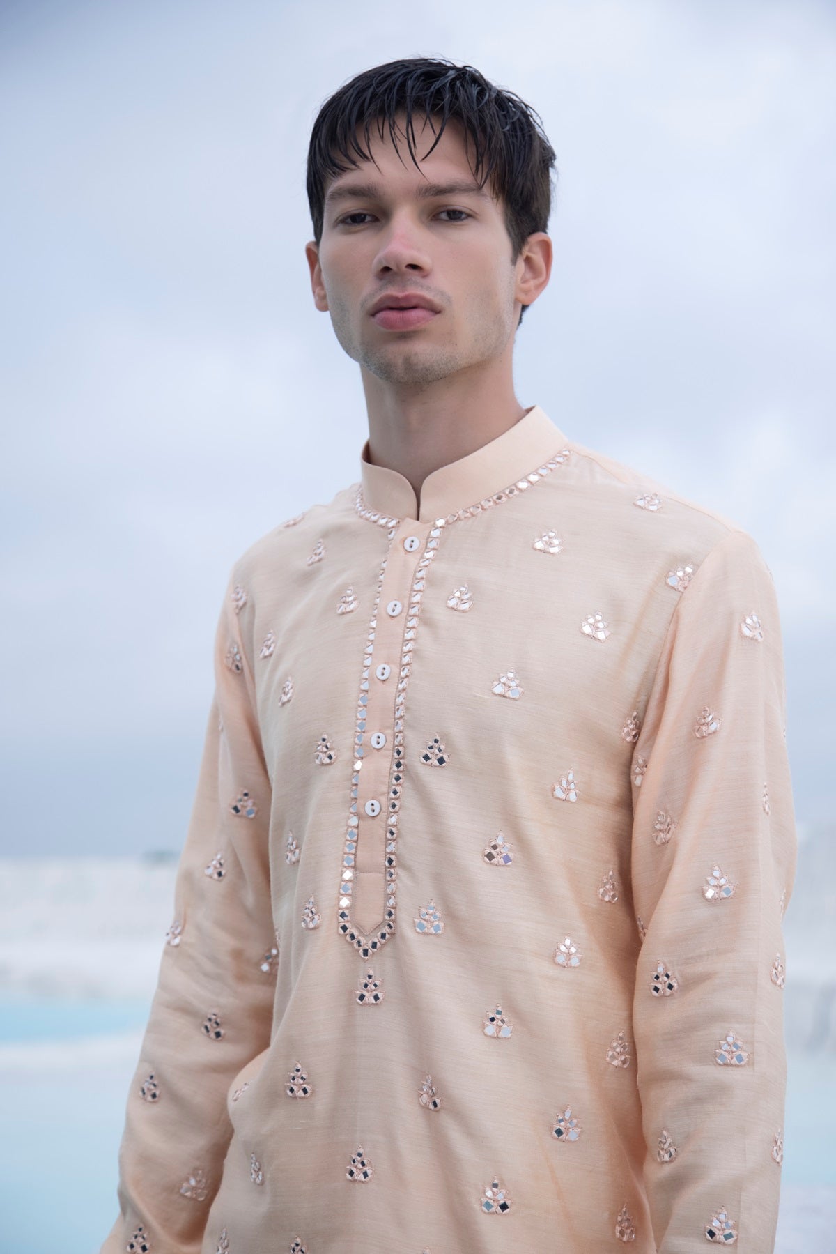 Pastel Silk Kurta with hand embroidered mirror work paired with Alighari pyjami