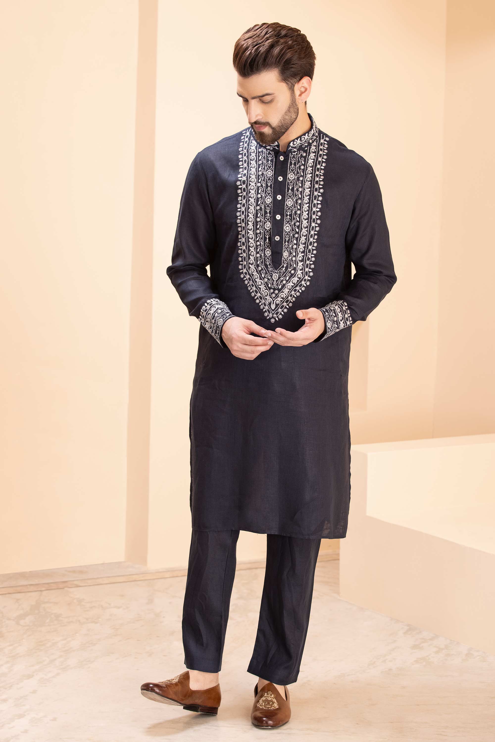Linen kurta with zari embroidery & metal work paired with aligadhi