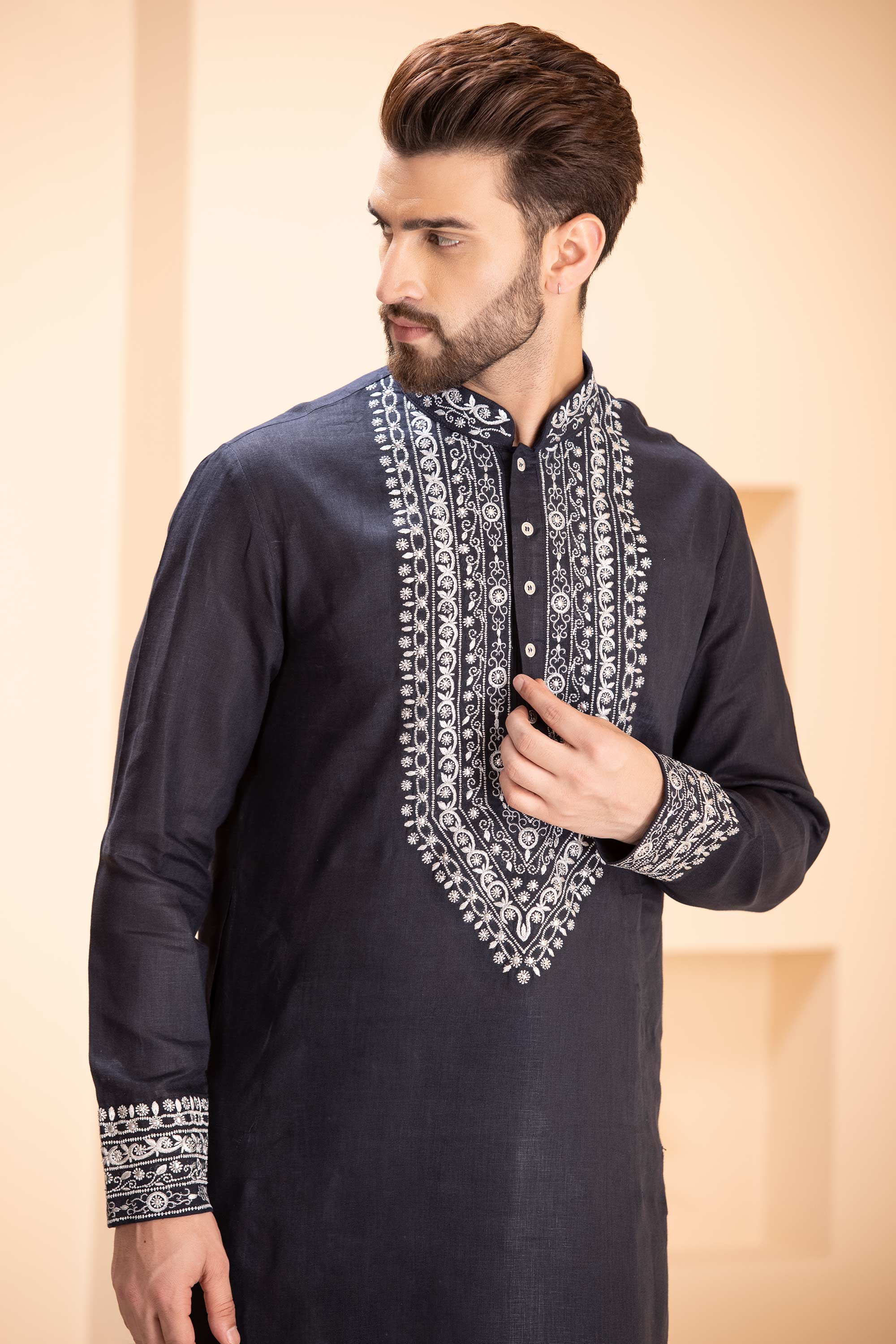 Linen kurta with zari embroidery & metal work paired with aligadhi