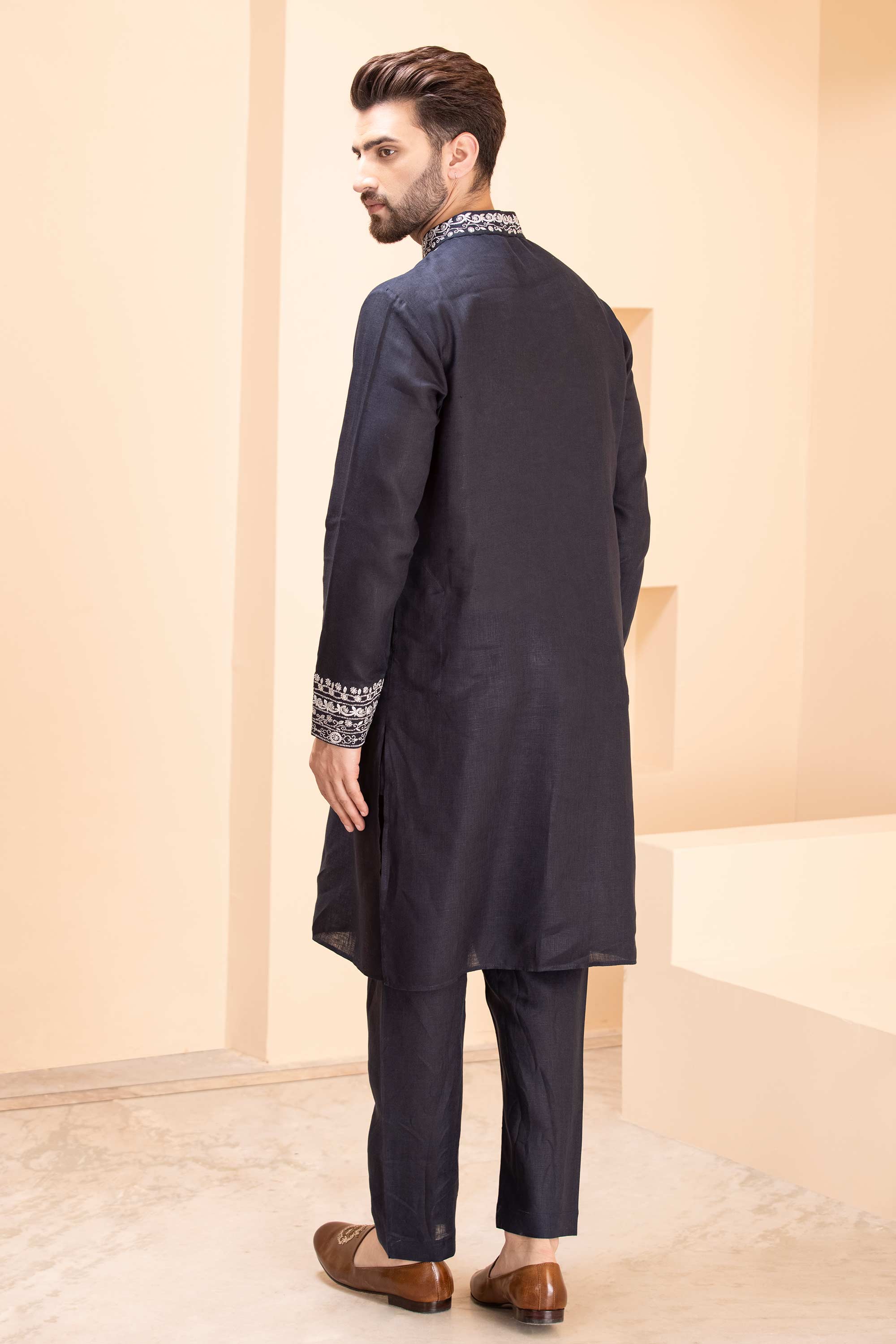 Linen kurta with zari embroidery & metal work paired with aligadhi