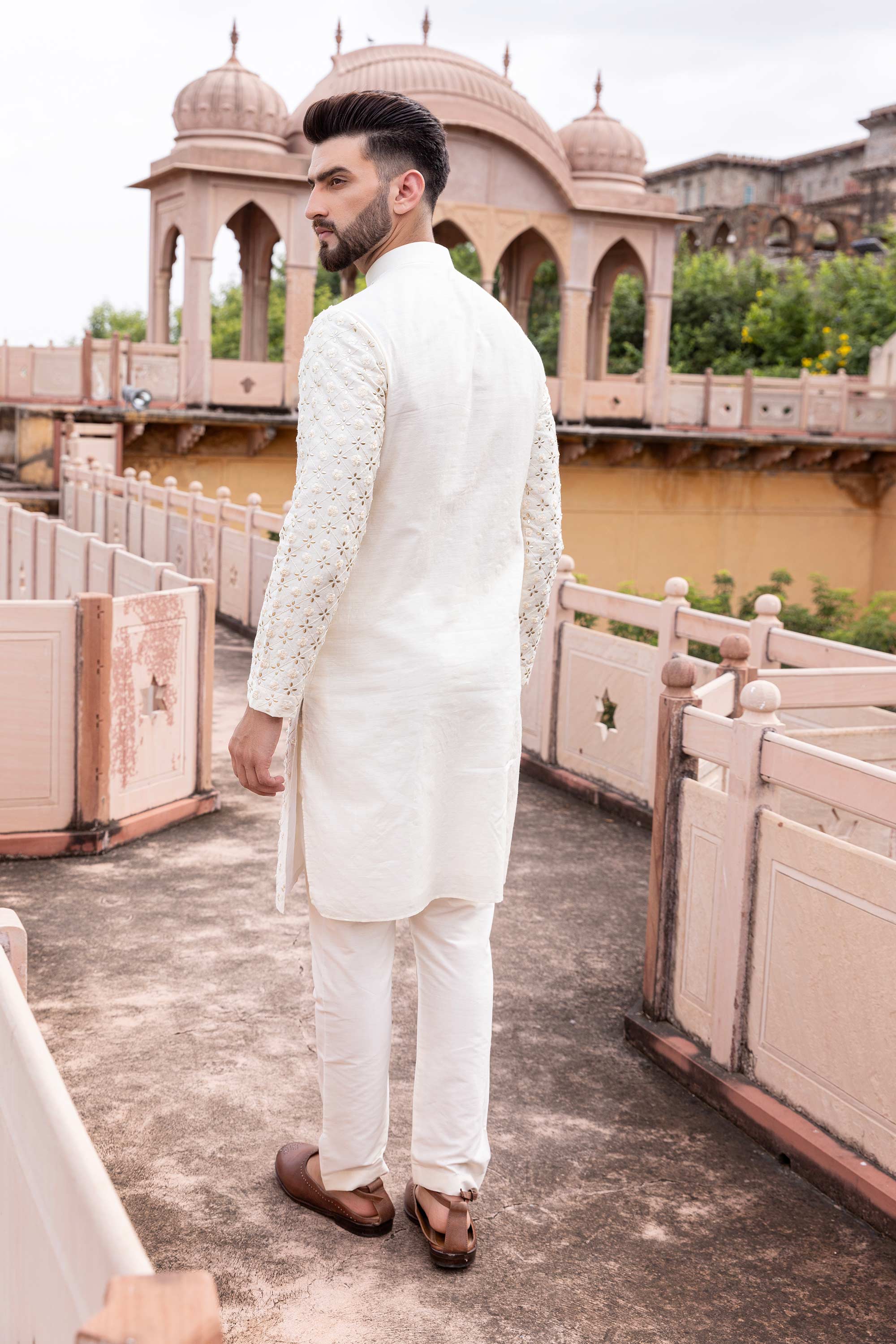 Metal work kurta paired with aligadhi.