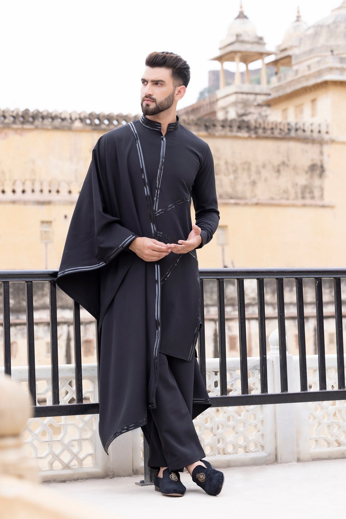 Tape work kurta paired with aligadhi and a stole.