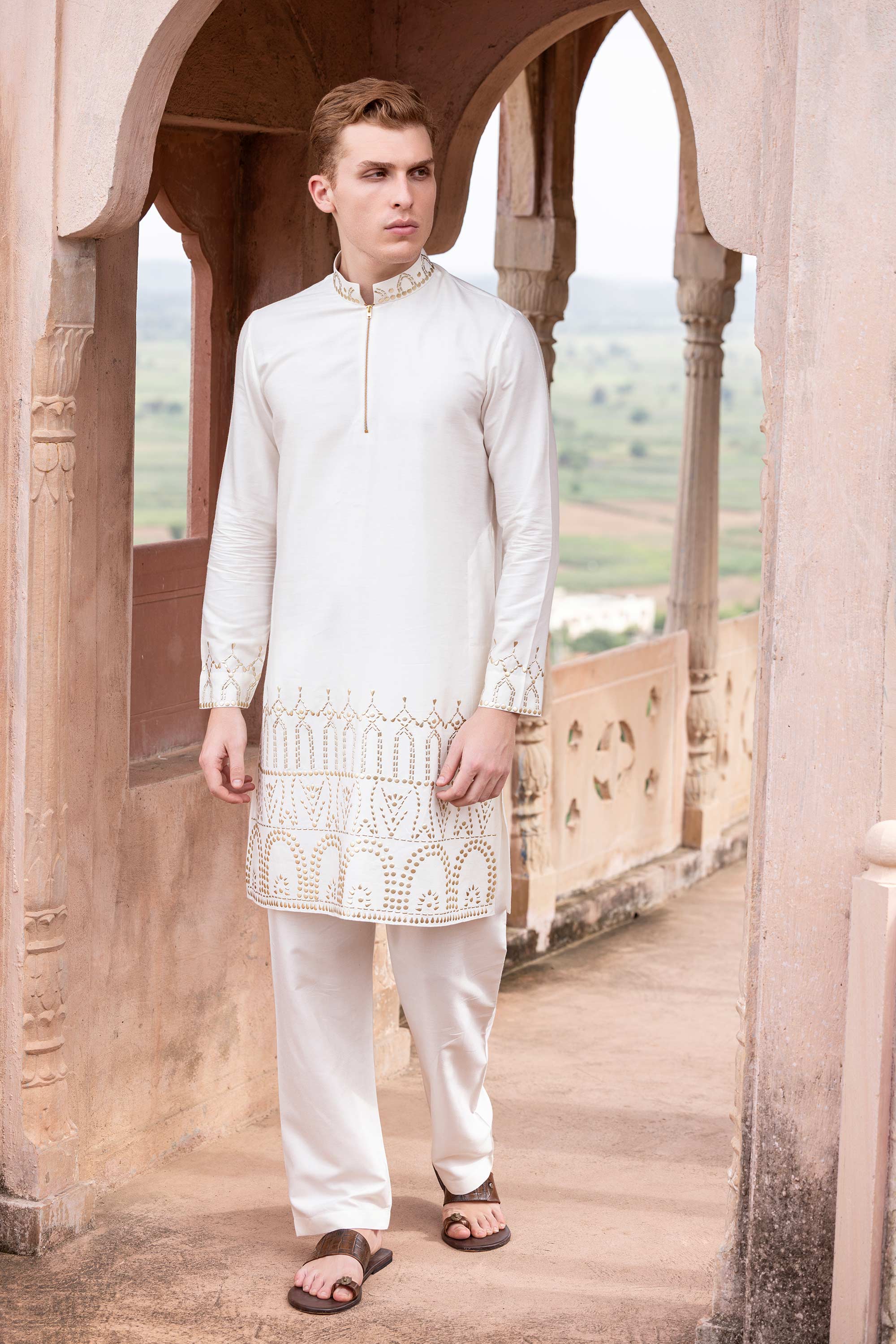 Metal work kurta paired with aligadhi.