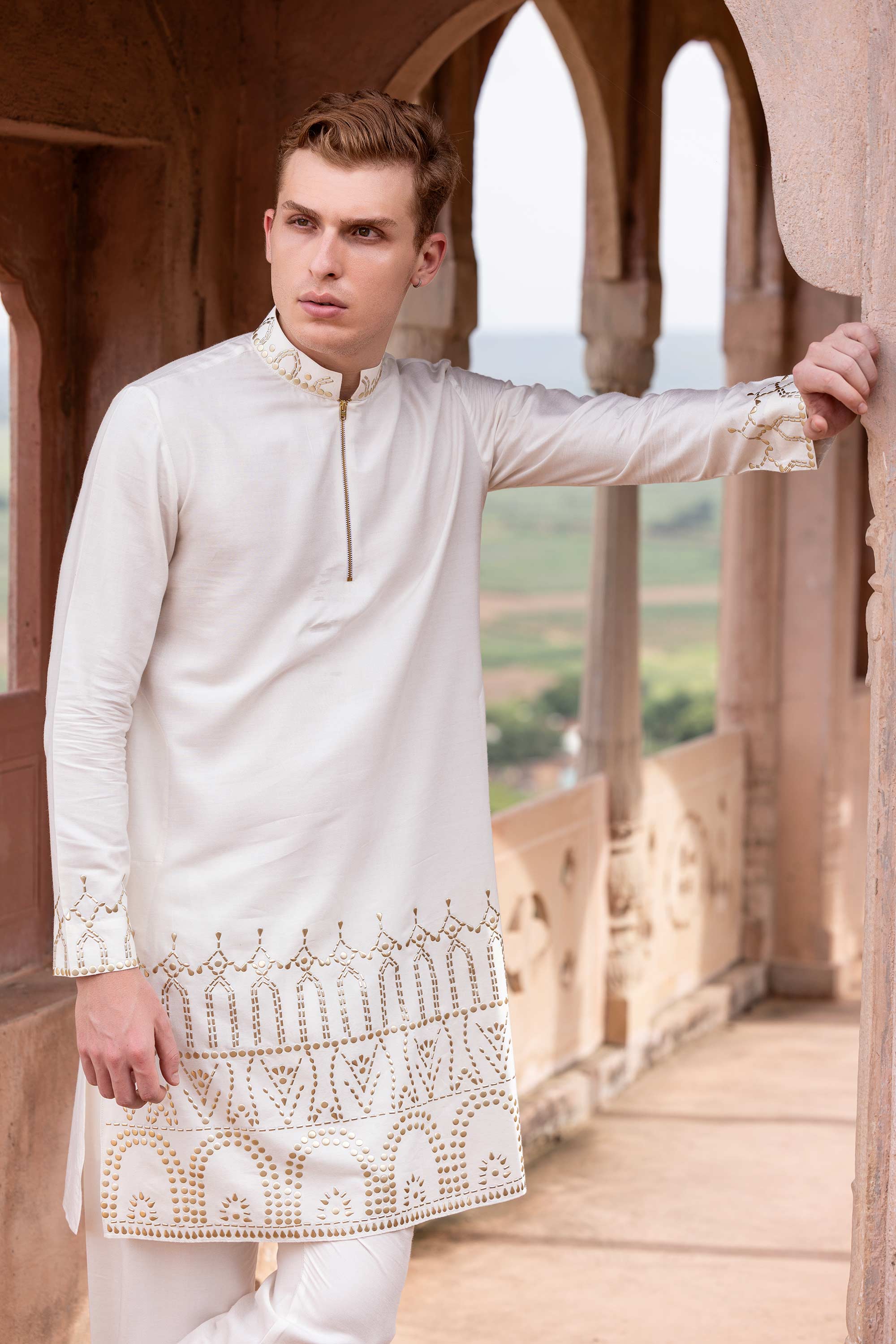 Metal work kurta paired with aligadhi.