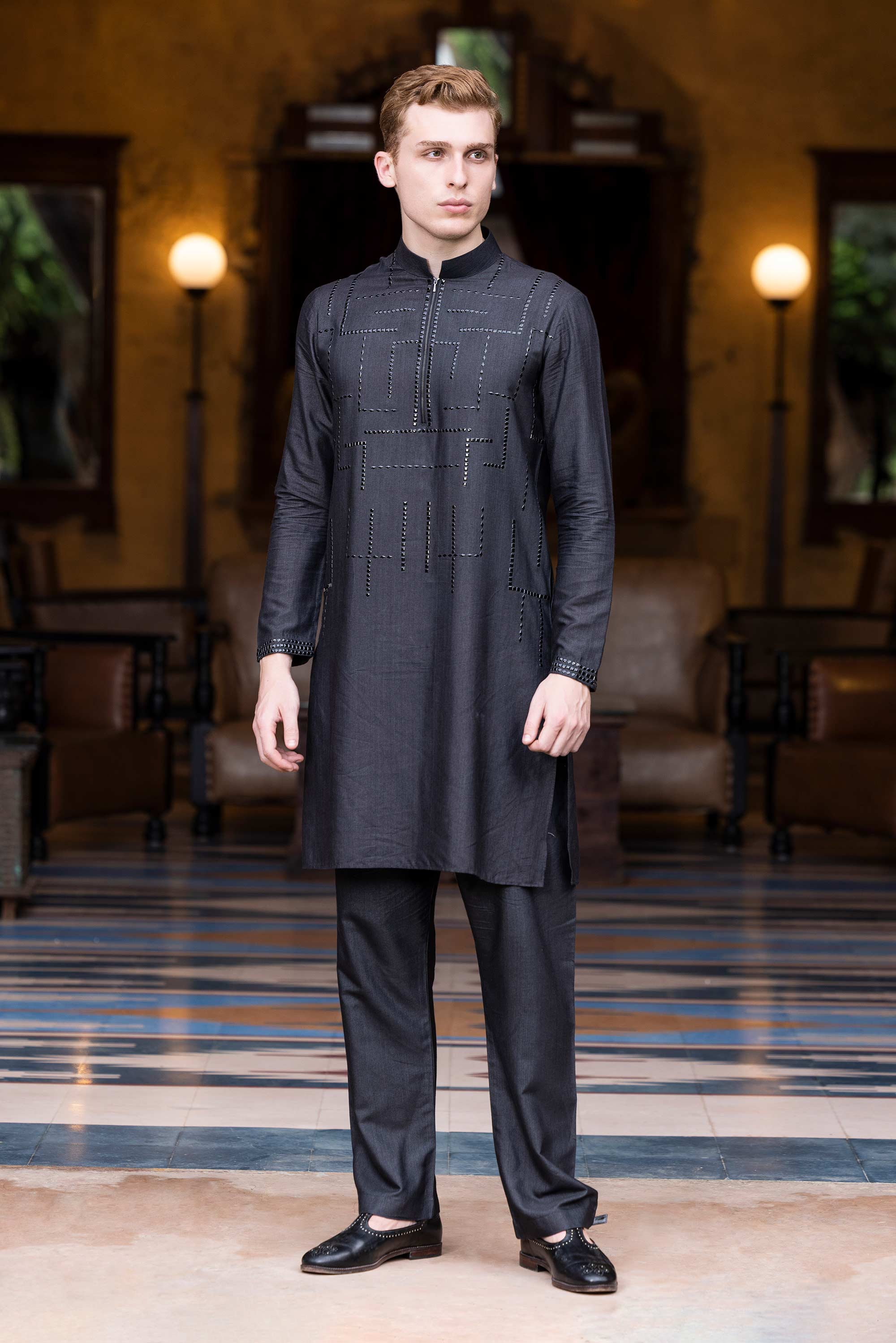Metal work kurta paired with aligadhi.