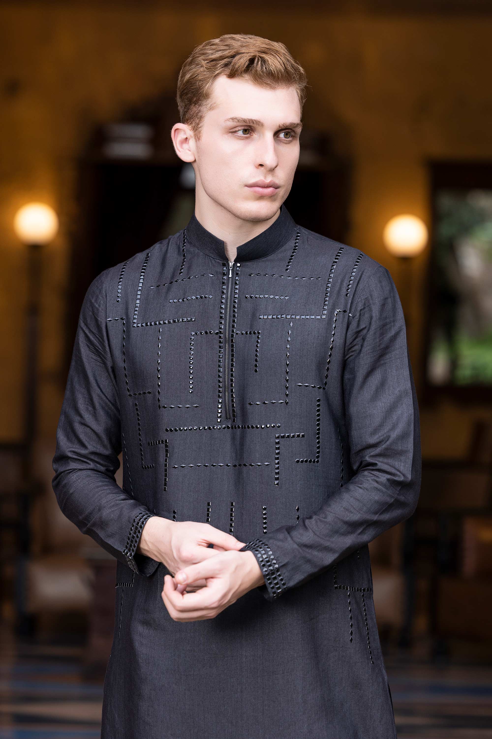 Metal work kurta paired with aligadhi.