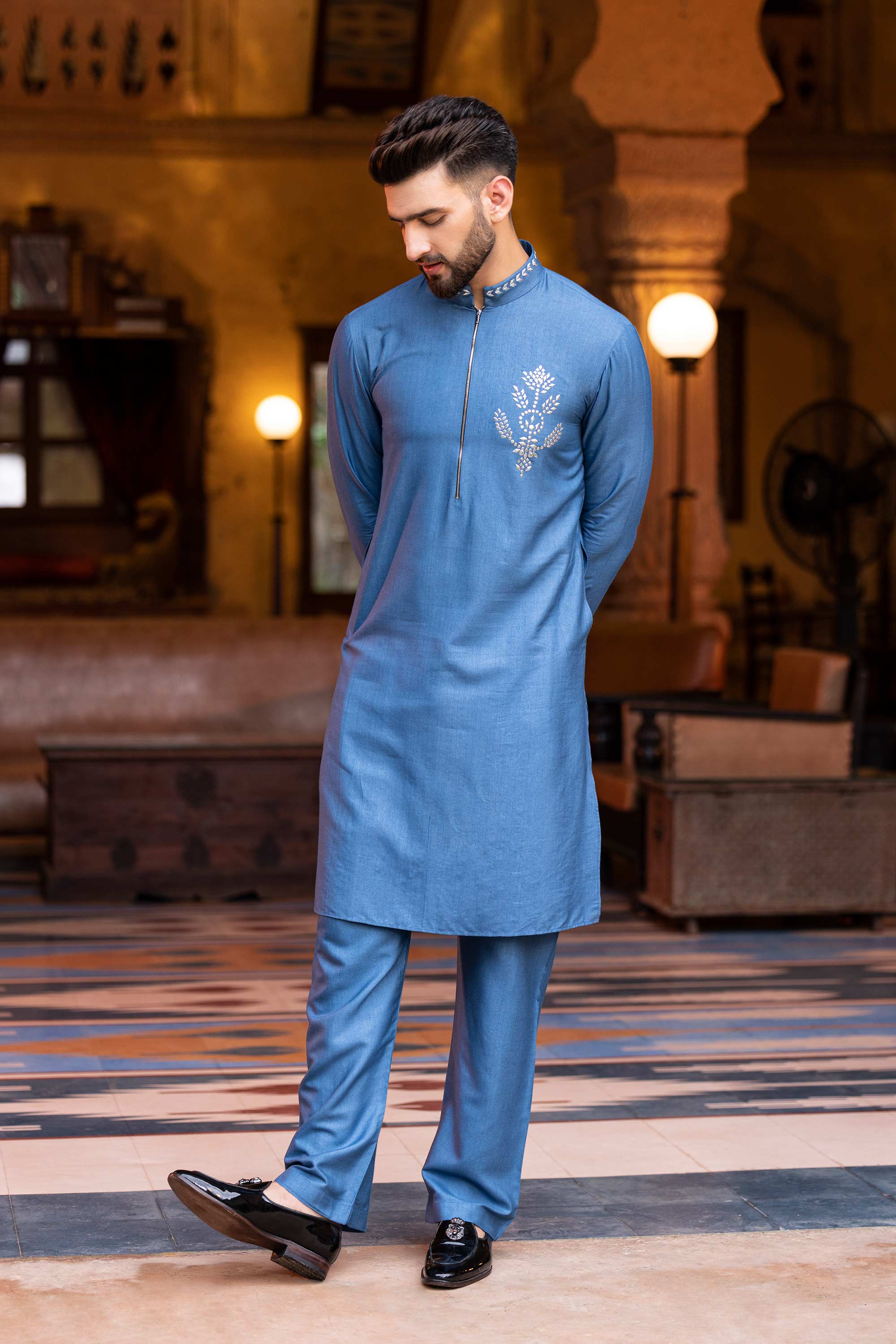 Metal work kurta paired with aligadhi.