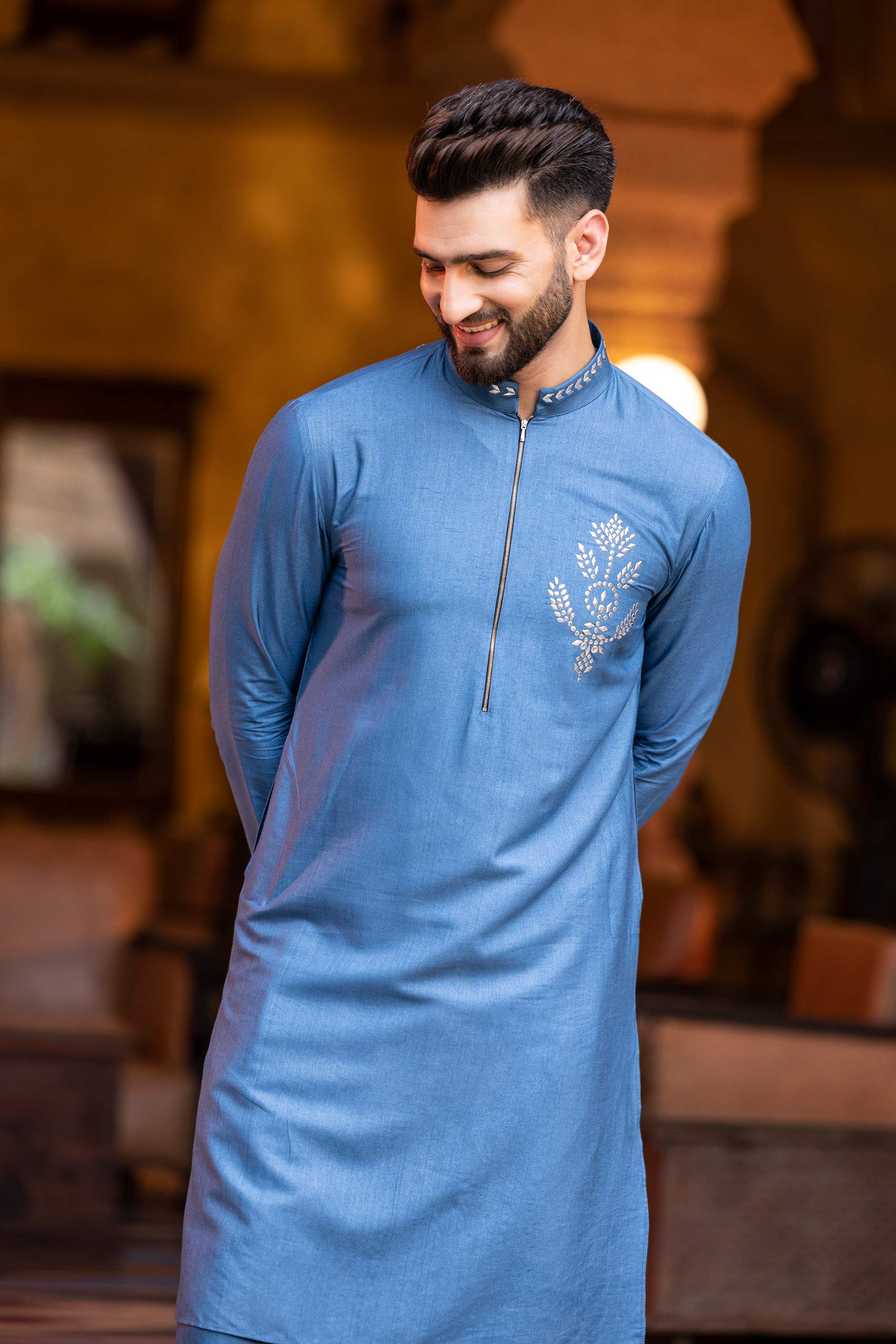 Metal work kurta paired with aligadhi.