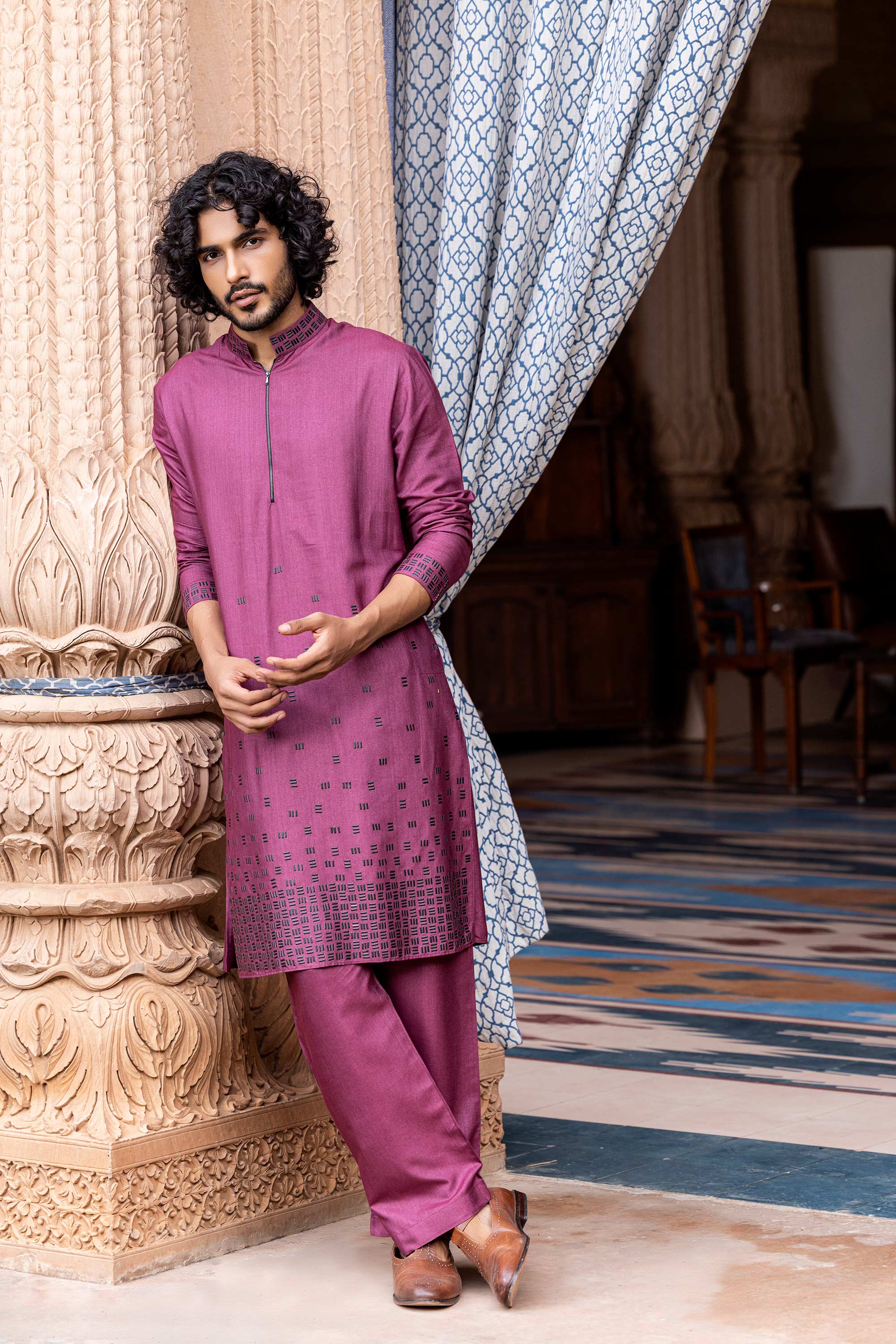 Metal work kurta paired with aligadhi.