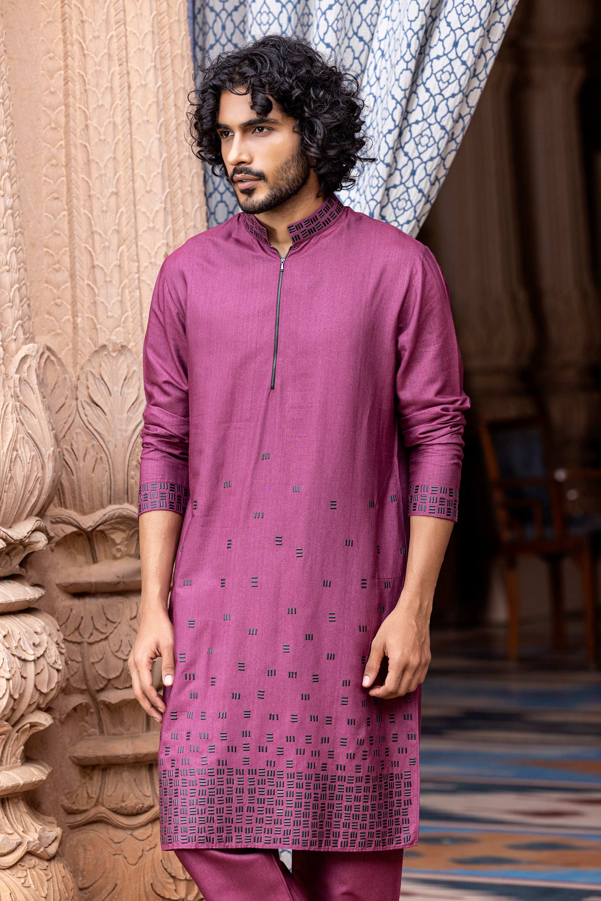 Metal work kurta paired with aligadhi.
