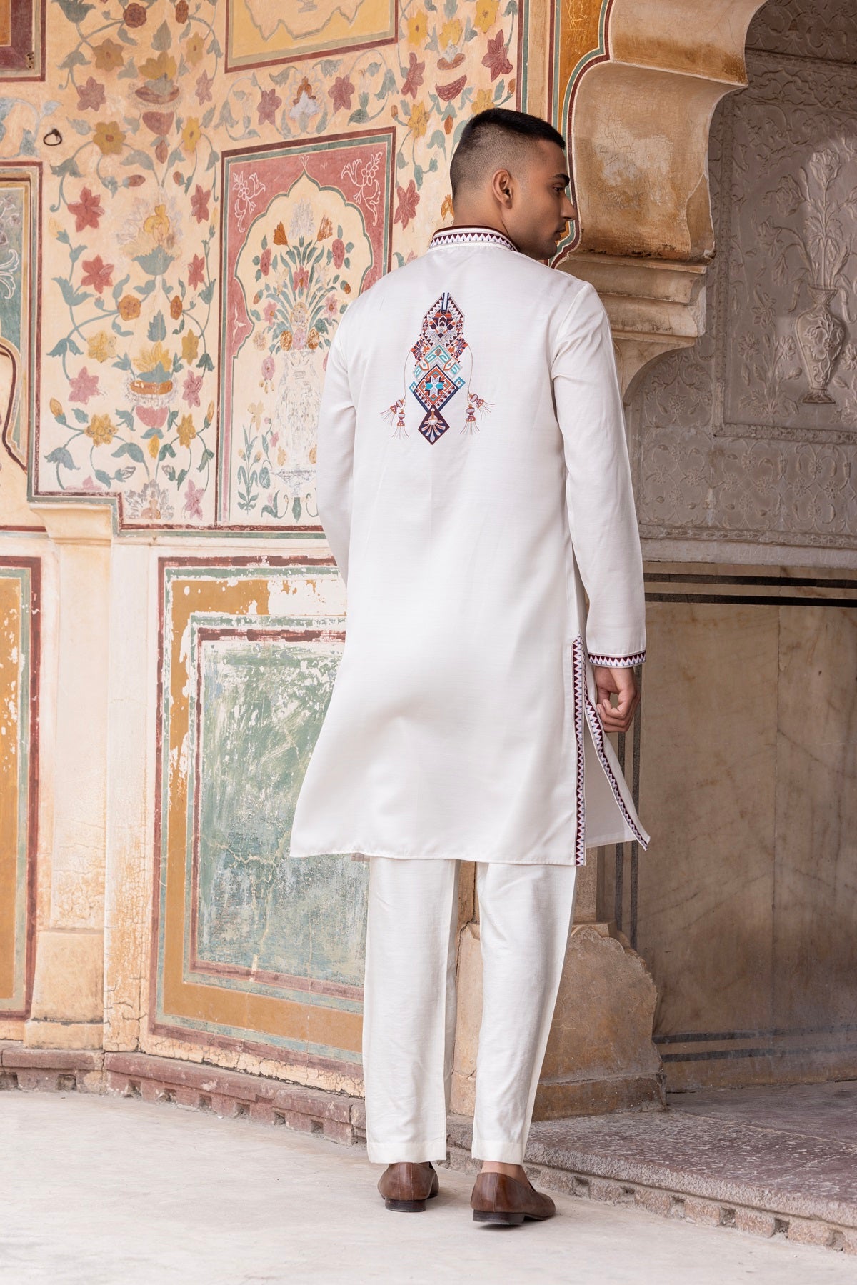 Digital print kurta paired with aligadhi.