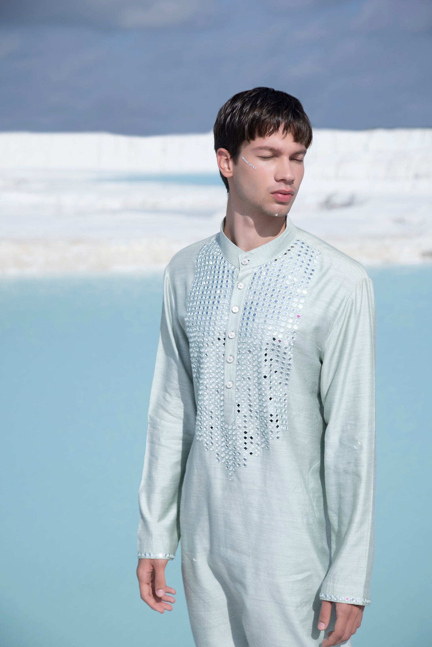 Pastel Silk Kurta with hand embroidered mirror work paired with Alighari pyjami