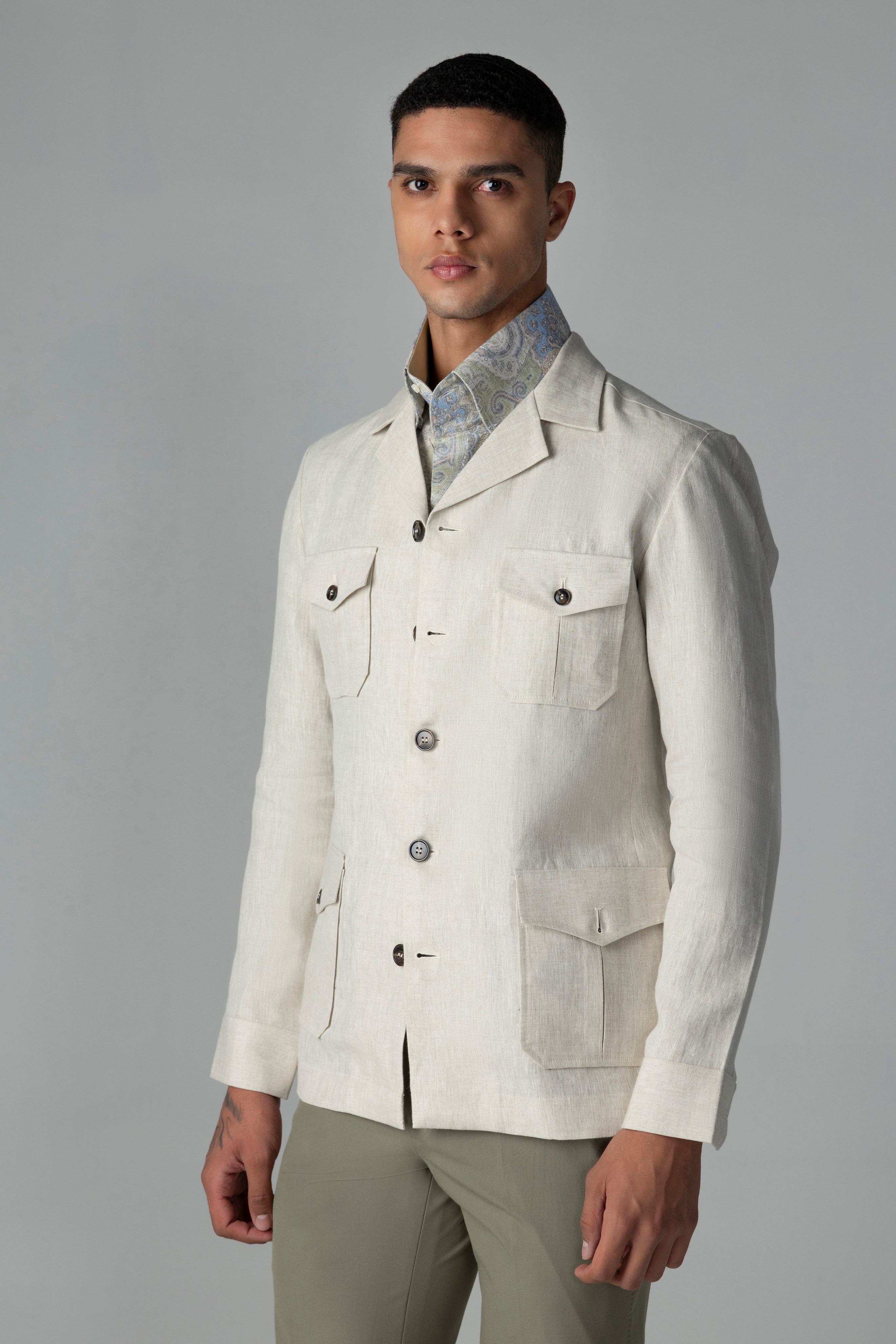 Beige linen shacket with four patch pockets, Cuban collar and contrast button detailing