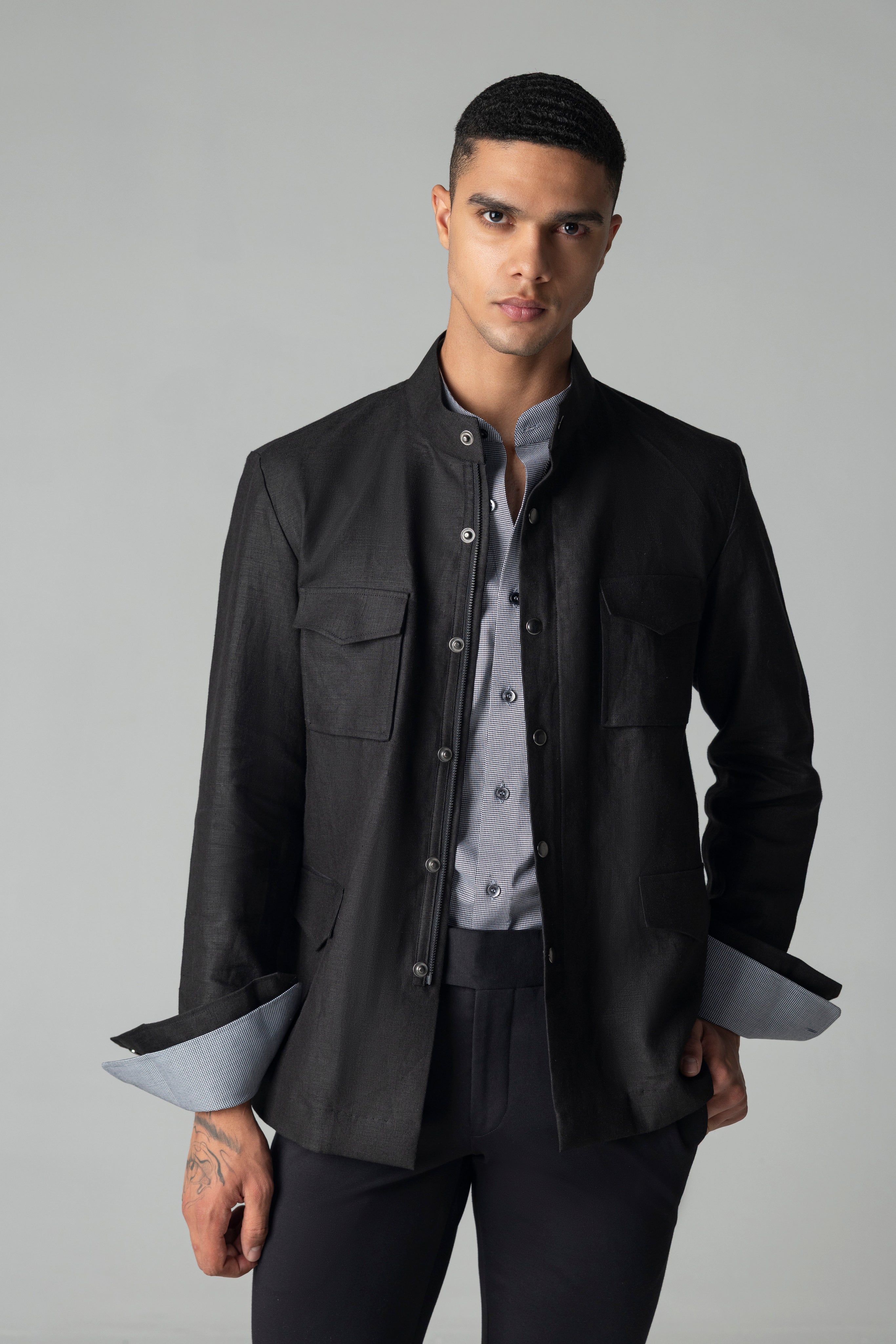 Black linen shacket with four patch pockets, Mandarin collar with zipper & snap button detailing.