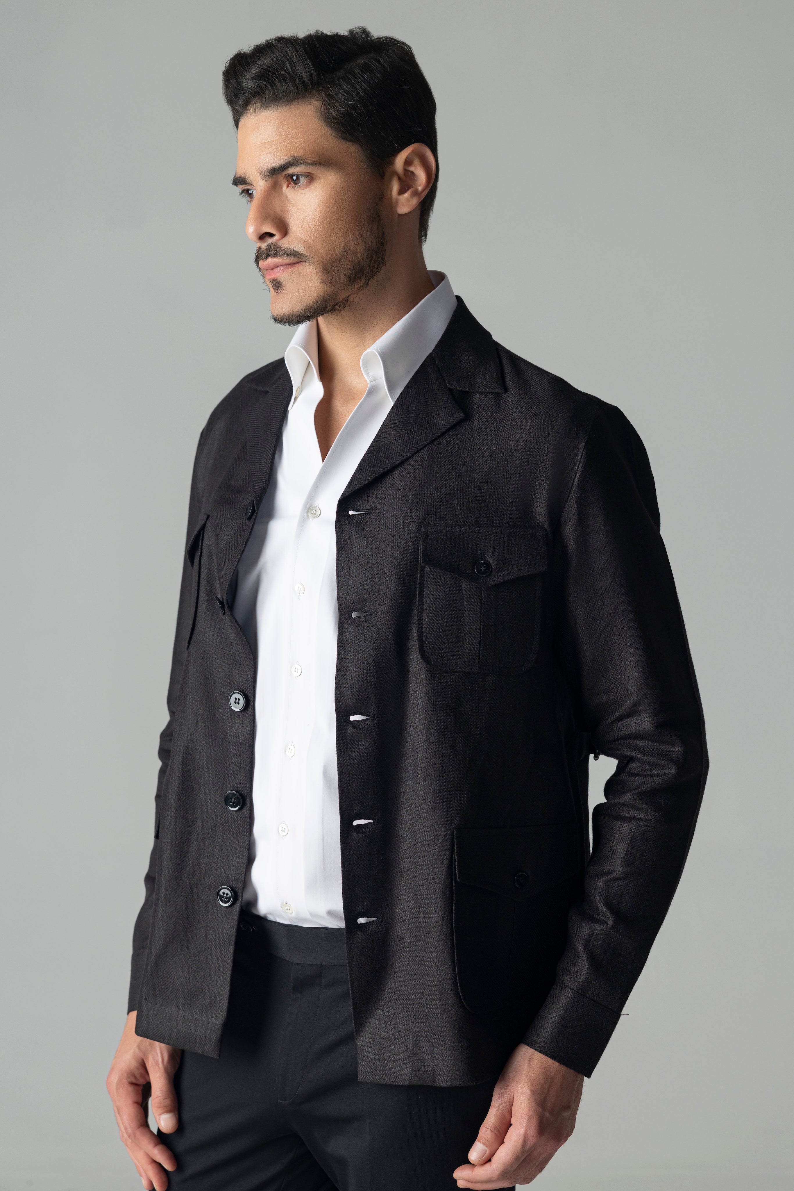 Black linen shacket with four patch pockets and Cuban collar
