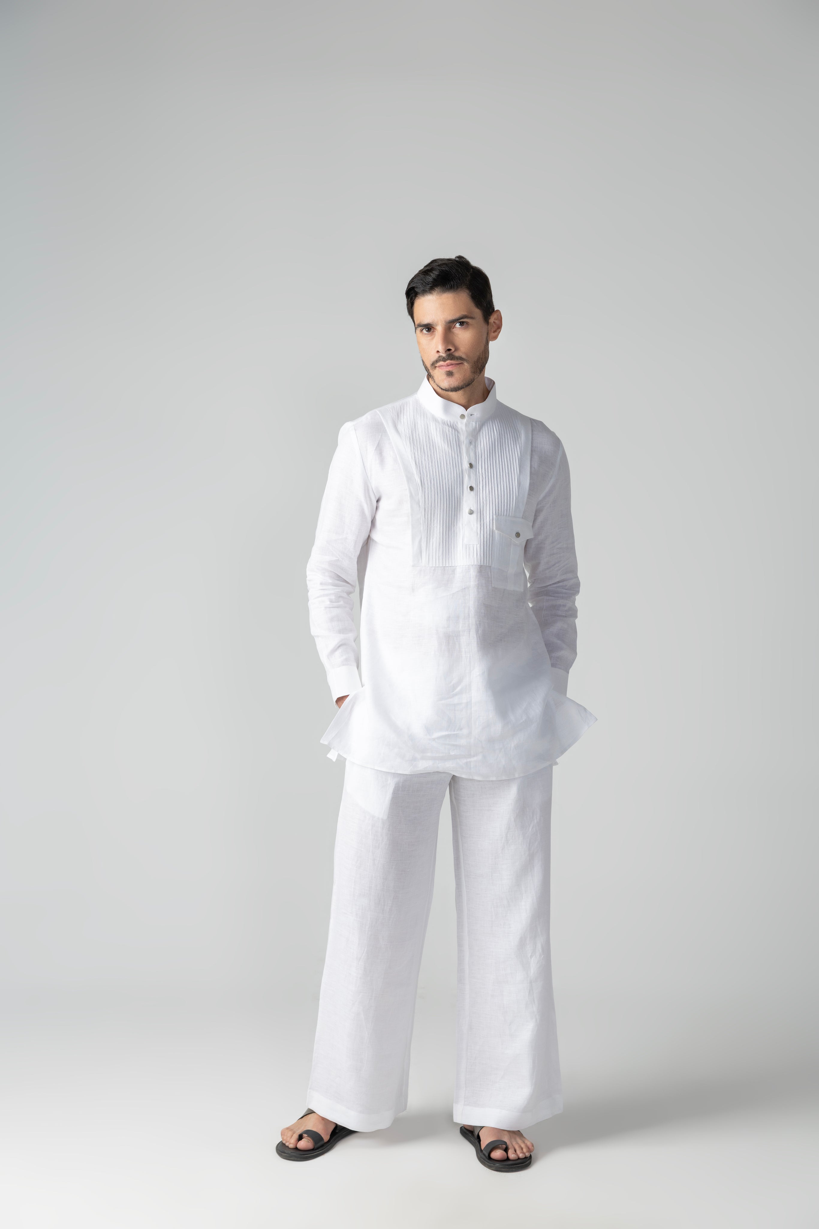 White short linen kurta with patch pocket & pintucks detailing, paired with a matching plazzo