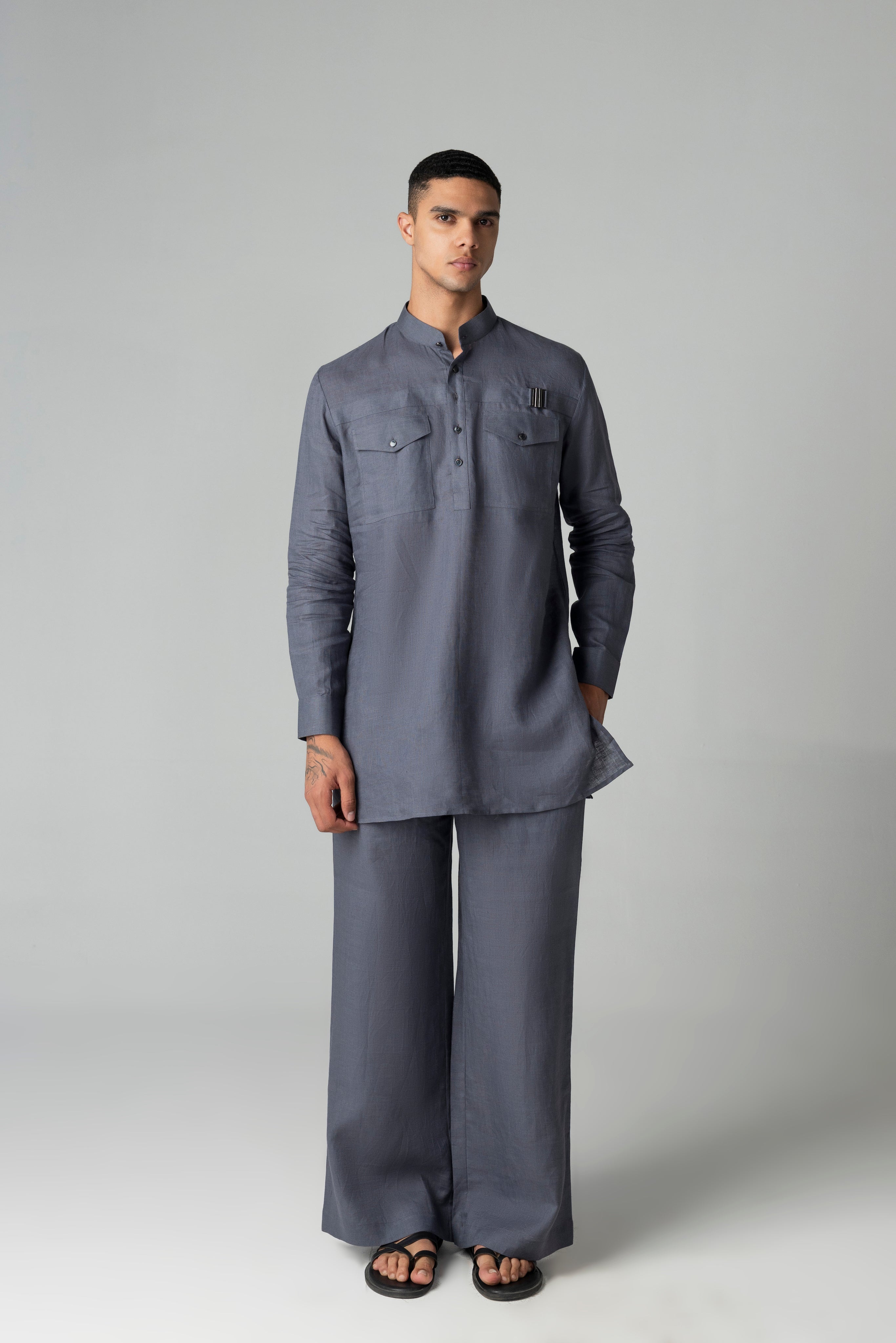 Grey short linen kurta with patch pocket & buckle detailing, paired with a matching plazzo
