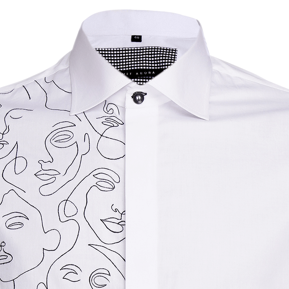 White long-sleeved shirt detailed with abstract faces illustration embroidery