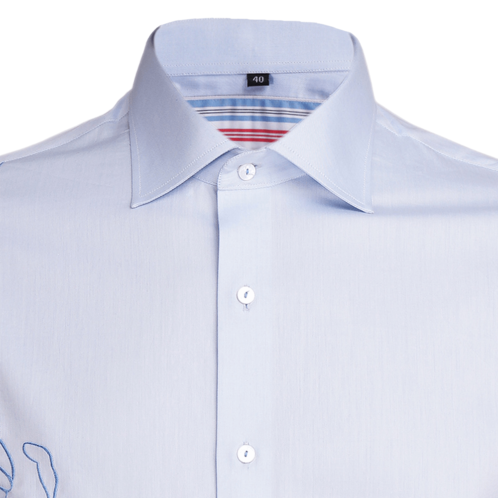 Sky Blue long-sleeved shirt with embroidery symbolising unity