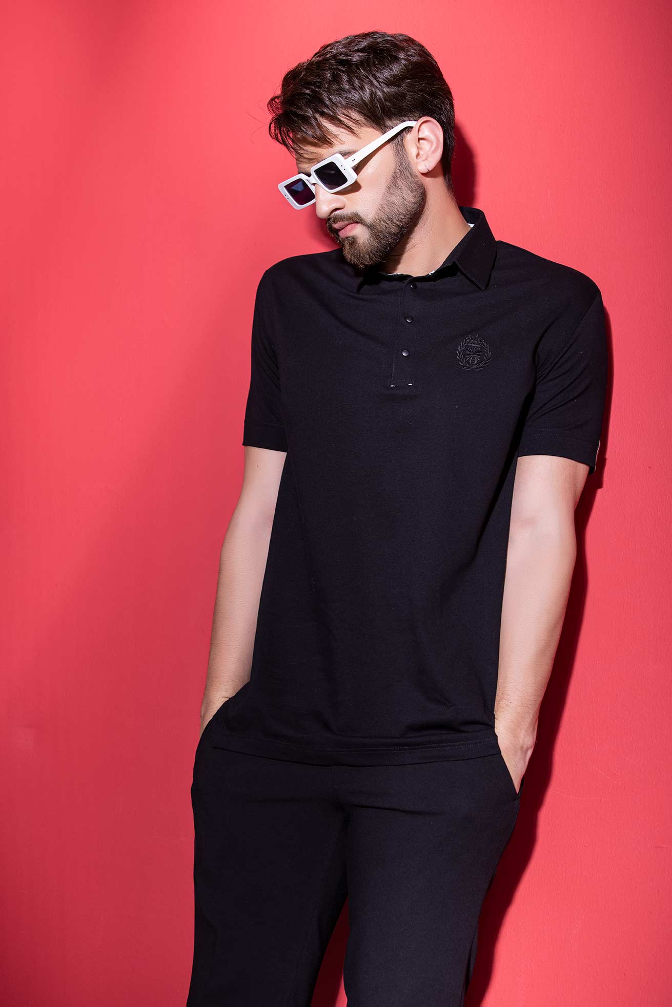 Black half-sleeved t-shirt with metal button & trims detailing