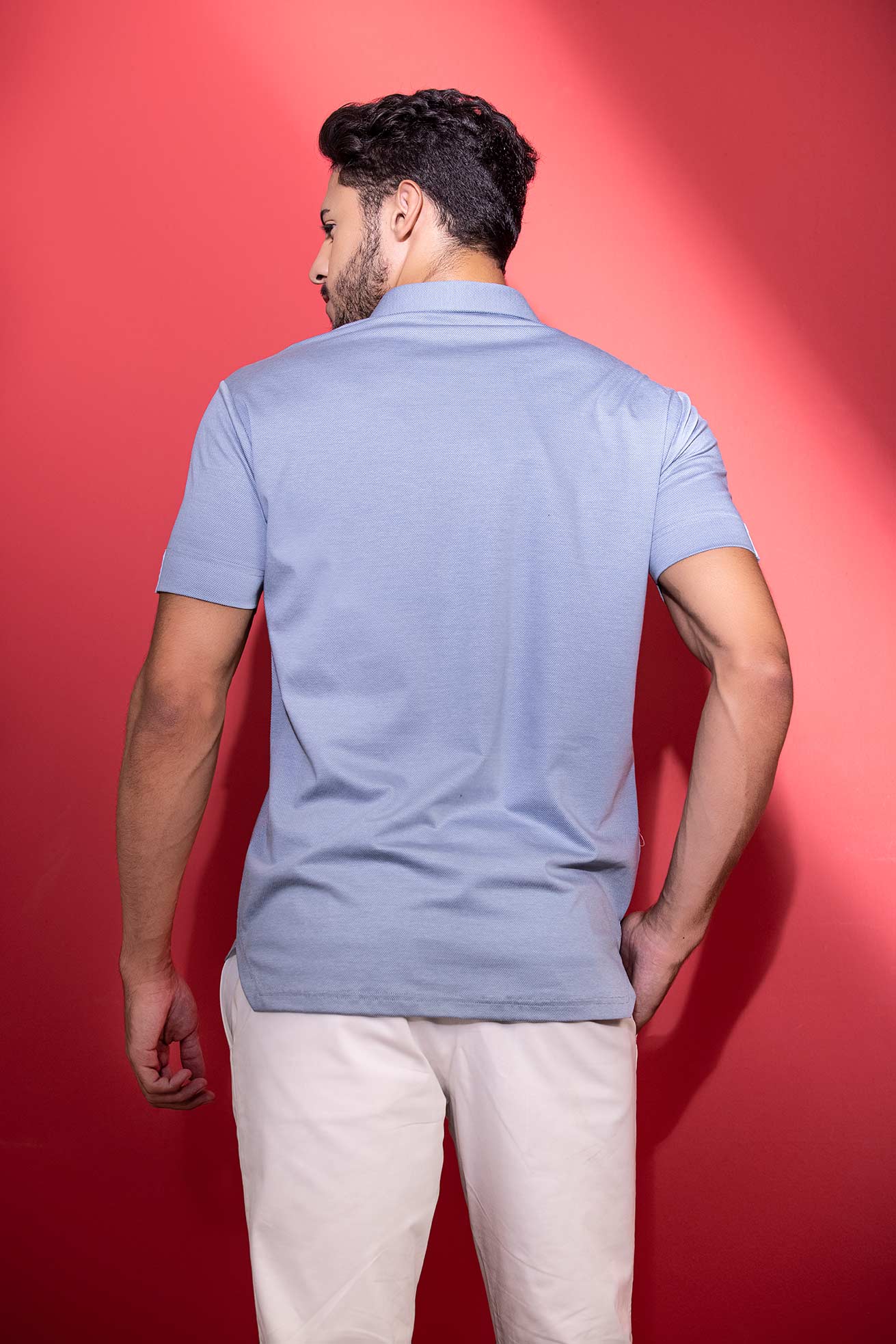 Sky Blue half-sleeved t-shirt with metal button & trims detailing