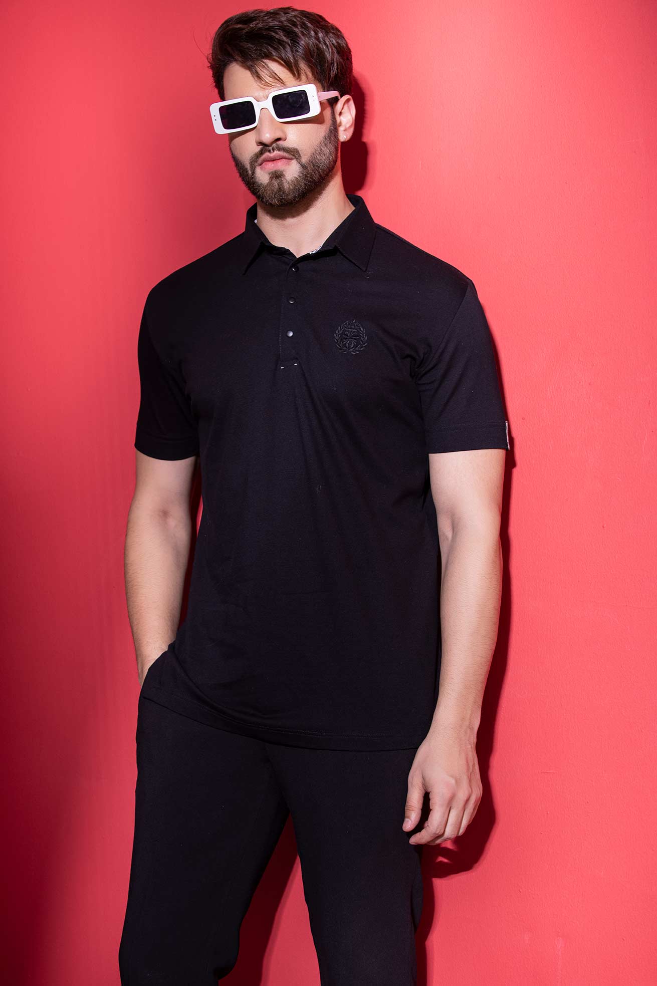 Black half-sleeved t-shirt with metal button & trims detailing